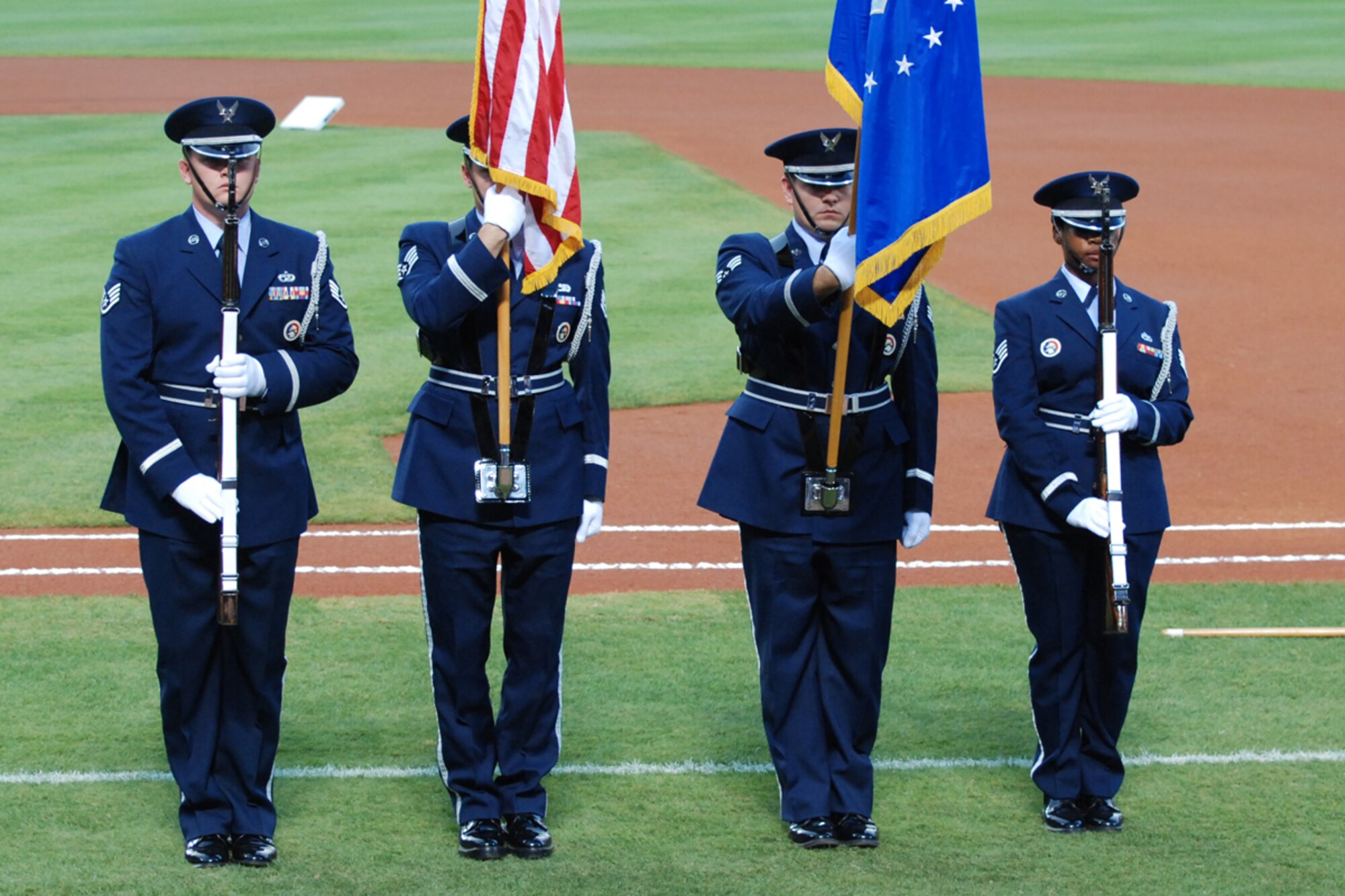 The 94th Airlift Wing Honor Guard presents the colors at the annual Atlanta Braves Military Appreciation Night Aug.26. The event is sponsored by the Marietta Kiwanis Club. (U.S. Air Force photo/Tech. Sgt. James Branch)