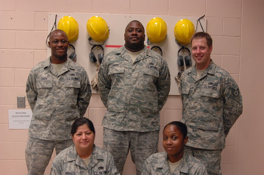 MOODY AIR FORCE BASE, Ga. -- The Air Force Repair Enhancement Program office here at Moody is staffed by five Airmen from a wide variety of Air Force Specialty Code career fields. These Airmen were hand-selected to be members of the AFREP team. (U.S. Air Force photo by Airman 1st Class Brigitte Brantley)