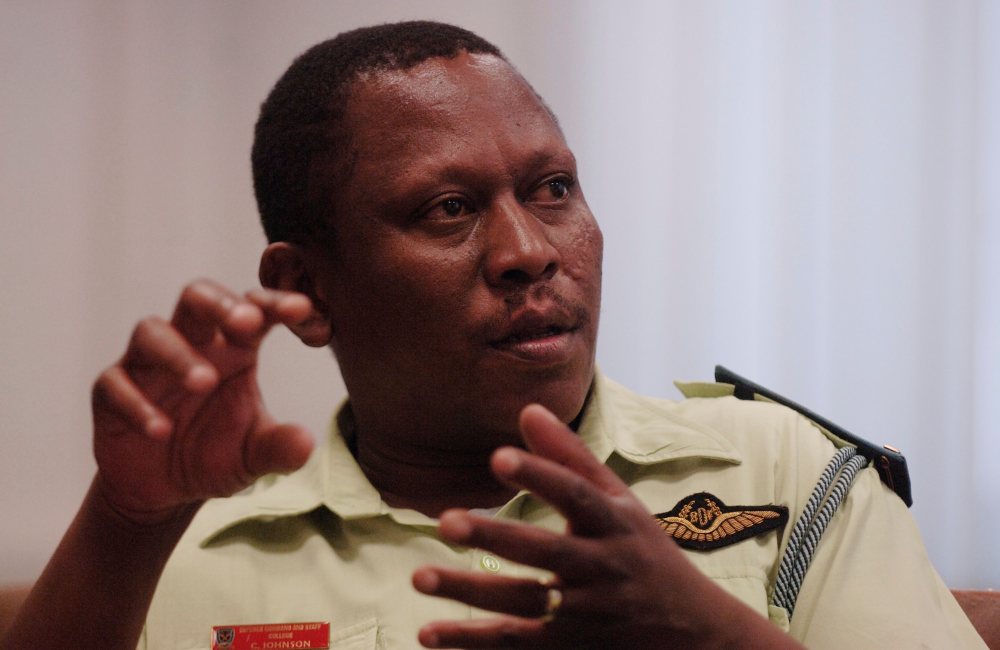 Major Charles Johnson of the Botswana Defense Force inquires about U.S. procedures during a joint tactical air control training brief at Einsiedlerhof Air Station.  Major Johnson's delegation of officers are the first from an African nation to visit the facility.
 (U.S. Air Force Photo by Master Sgt. Donald Wagers.)
