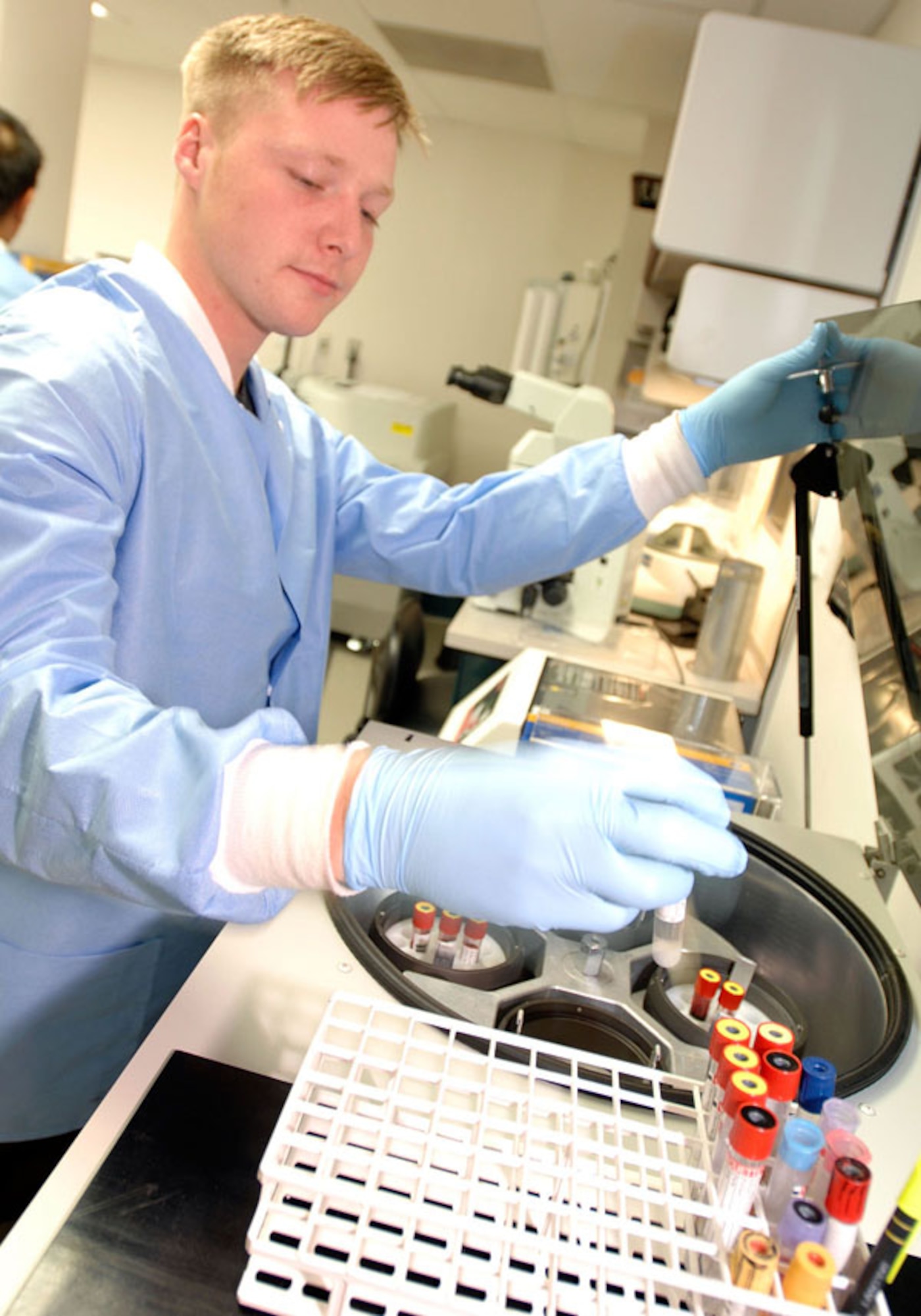Airman 1st Class Andrew Anderson, 22nd Medical Support Squadron laboratory technician at McConnell Air Force Base, Kan., prepares blood samples for centrifugation, a process which separates blood into solid and liquid portions. The liquid, also known as serum or plasma, is analyzed for a variety of laboratory tests. (U.S. Air Force photo/ Senior Airman Jessica Lockoski)