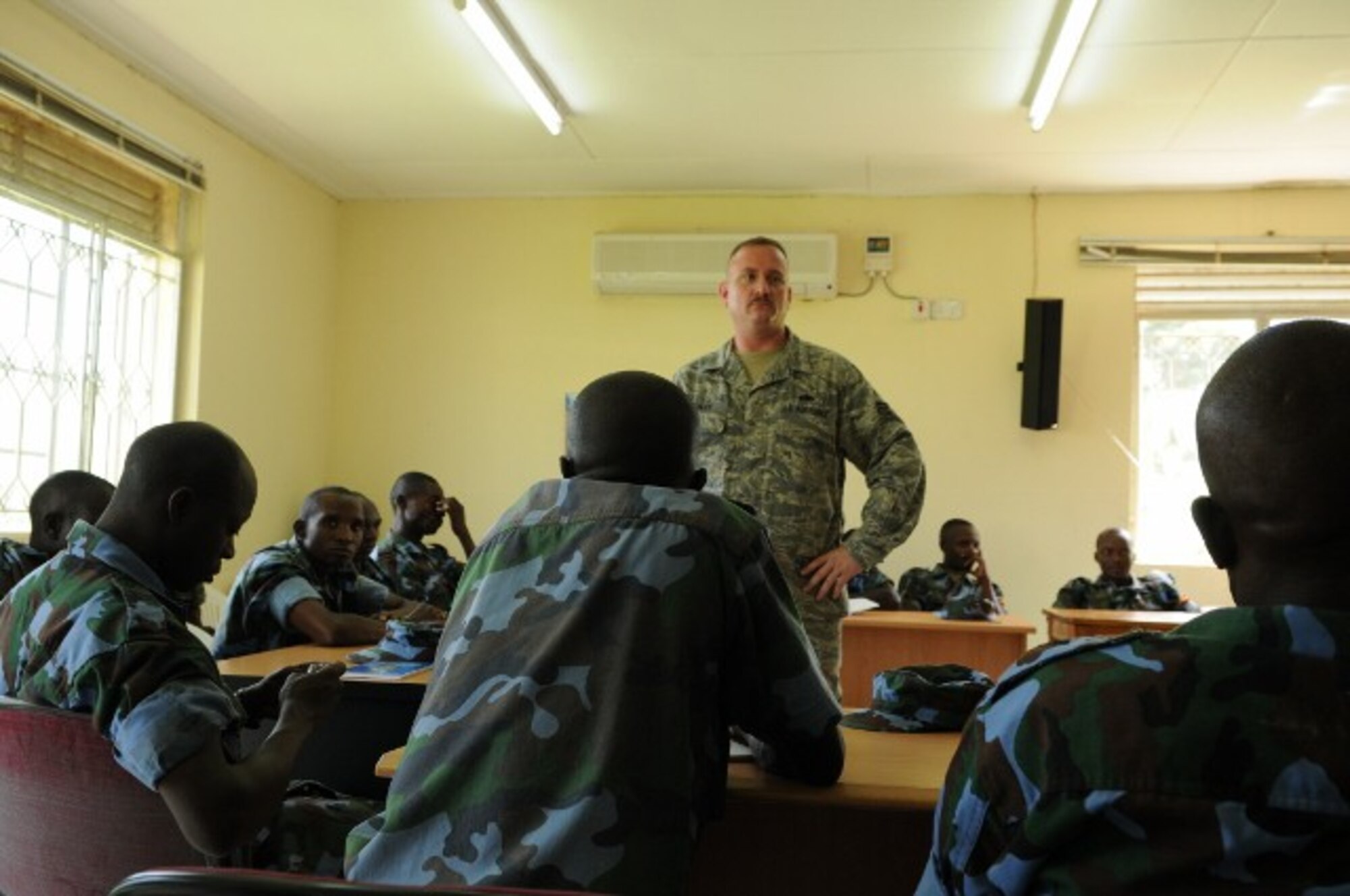 TSgt. Greg Henley, 86th Aircraft Maintenance Squadron, leads a class on conducting air drops during a Theather Security Cooperation event with the Ugandan Peoples Defense Forces Aug 26 in Entebbe, Uganda. (U.S. Air Force photo by Maj. Paula Kurtz.)