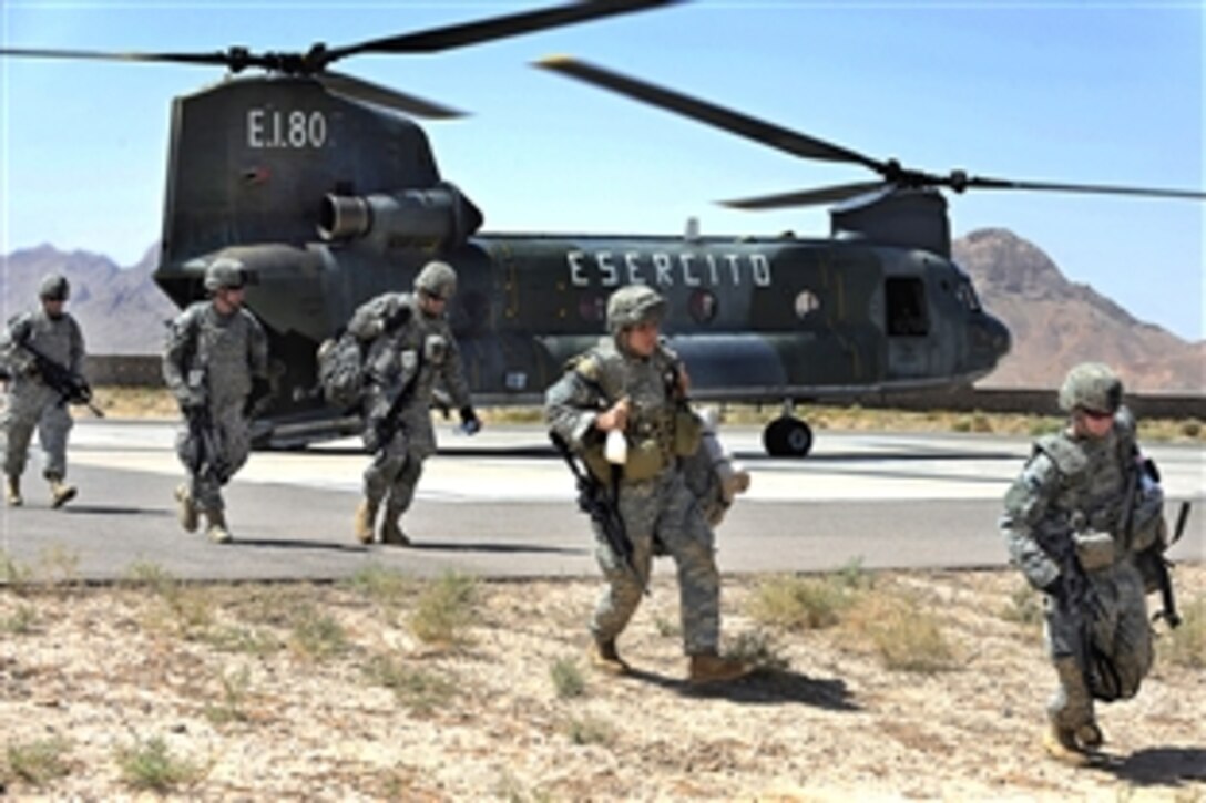 U.S. Army soldiers arrive on Camp Zafar in Herat, Afghanistan, Aug. 24, 2009. The soldiers, assigned to the 82nd Airborne Division's Brigade Combat Team 4, will assume responsibility for operations in the west and south regions of Afghanistan.