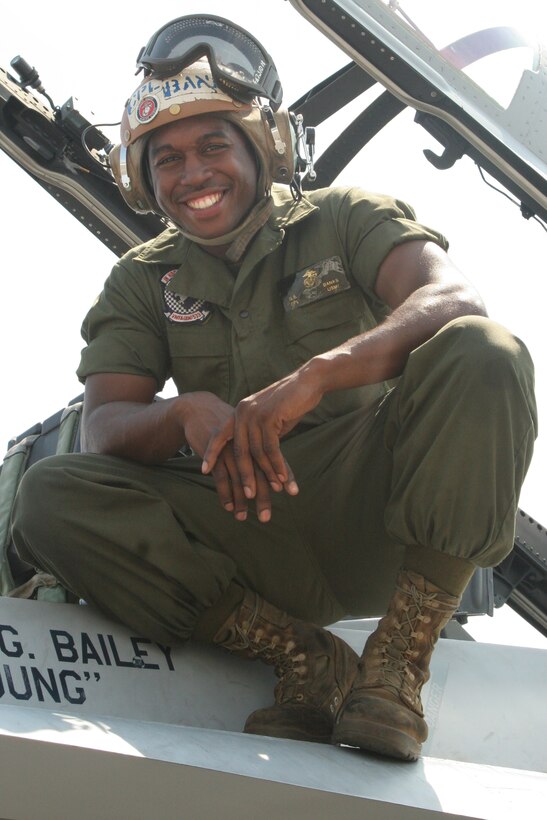 Cpl. Gregory Steven Banks, a Marine All-Weather Fighter Attack Squadron 533 aviation jet engine mechanic, sits atop a VMFA(AW)-533 F/A-18 on the flightline here Aug. 27. Banks was majoring in psychology and criminal justice at the University of Cinncinati in Ohio when he discovered he would be a father. Opting to join the Marine Corps, Banks ultimately had to face difficult mental challenges after graduating boot camp.