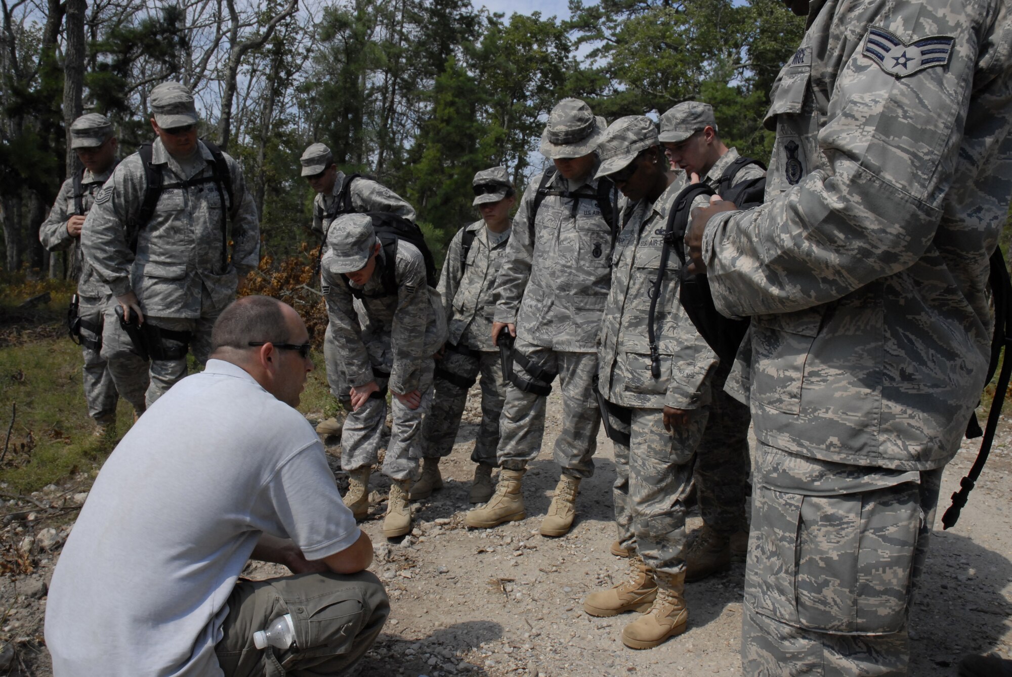 An EOD instructor, Mr. David Leventhal, shows security forces students what signs to look for that there is an IED placed on their convoy route during a training exercise on a Fort Dix range, August 26, 2009, conducted by the 421st Combat Training Squadron hosted by the U.S. Air Force Expeditionary Center, Joint Base McGuire-Dix-Lakehurst, N.J. (U.S. Air Force Photo/Tech. Sgt. Paul R. Evans)