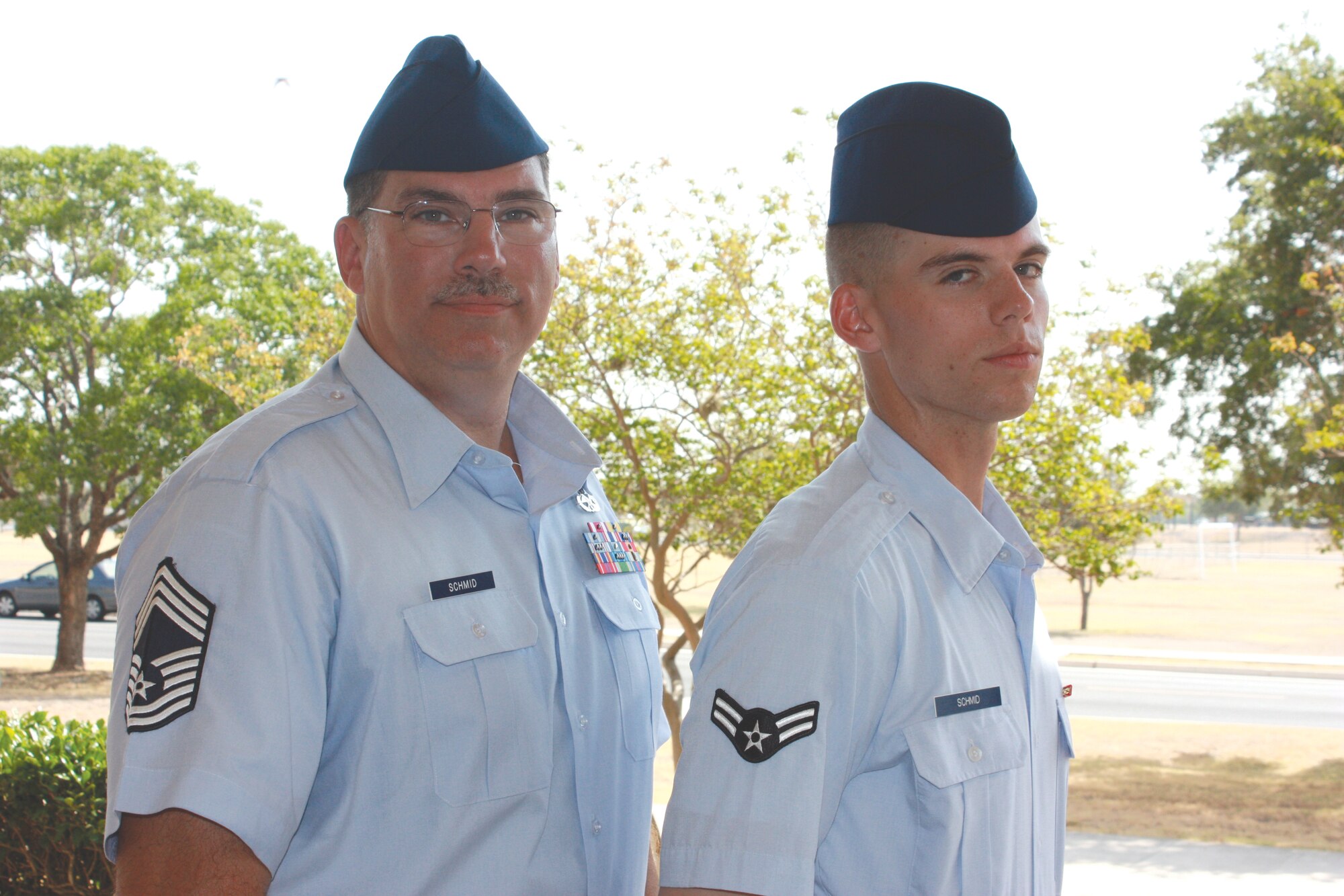 Chief Master Sgt. David Schmid, 712th Aircraft Maintenance Squadron, flew to Lackland Air Force Base, Texas, July 17 to see his 19-year-old son graduate from Air Force Basic Military Training. Airman 1st Class Ryan Schmid joined the 326th Airlift Squadron as a C-17 loadmaster. (U.S. Air Force photo)