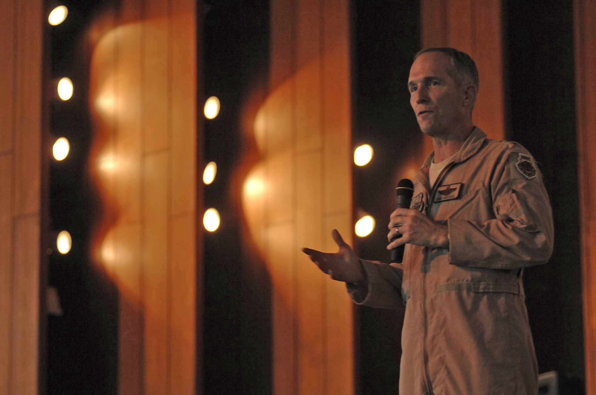 Lt. Gen. Mike Hostage speaks to Airmen Aug. 25 at Joint Balad Base, Iraq. General Hostage and Chief Master Sgt. Scott Dearduff met with Army officials from the 13th Sustainment Command (Expeditionary), received a mission brief about the MC-12 aircraft and toured the Air Force Theater Hospital. General Hostage is the commander of U.S. Air Forces Central Command. Chief Dearduff is the AFCENT command chief. (U.S. Air Force photo/Senior Airman Christopher Hubenthal) 