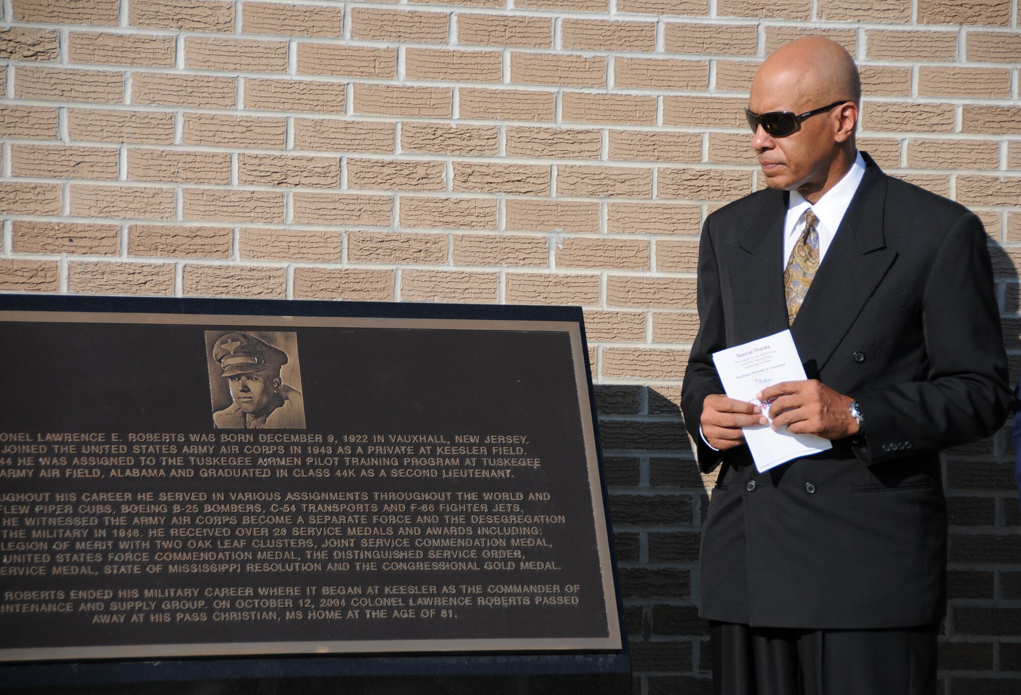 Team Keesler held a dedication ceremony of the Consolidated Aircraft Maintenance Facility named after Col. (Ret.) Lawrence Roberts who served as a Tuskegee Airman and adopted Biloxi, Miss. as his home. The $22.6 million facility will be used to  maintain the C-130J six-bladed composite  propeller, and many other significant maintenance capabilities. The Roberts' family, along with over 250 community and civic leaders, shared in the momentous occasion. (U.S. Air Force photo by Kemberly Groue)