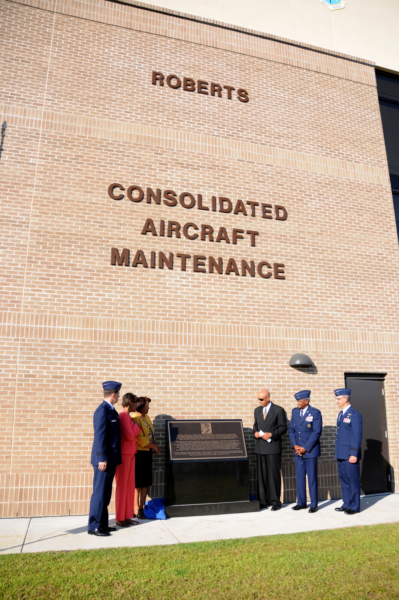 Team Keesler held a dedication ceremony of the Consolidated Aircraft Maintenance Facility named after Col. (Ret.) Lawrence Roberts who served as a Tuskegee Airman and adopted Biloxi, Miss. as his home. The $22.6 million facility will be used to  maintain the C-130J six-bladed composite  propeller, and many other significant maintenance capabilities. The Roberts' family, along with over 250 community and civic leaders, shared in the momentous occasion. (U.S. Air Force photo by Kemberly Groue)