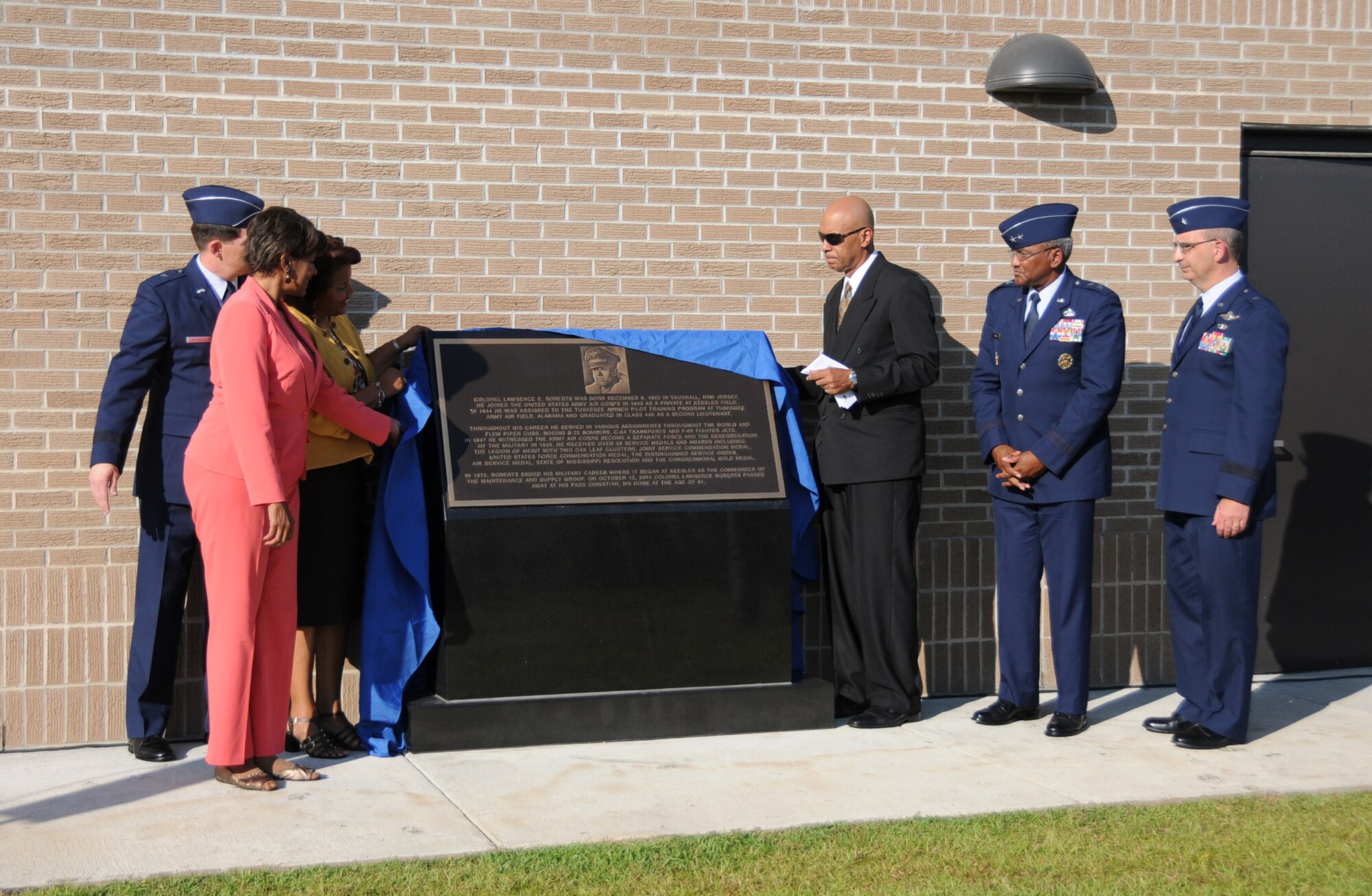 Team Keesler held a dedication ceremony of the Consolidated Aircraft Maintenance Facility named after Col. (Ret.) Lawrence Roberts who served as a Tuskegee Airman and adopted Biloxi, Miss. as his home. The $22.6 million facility will be used to  maintain the C-130J six-bladed composite  propeller, and many other significant maintenance capabilities. The Roberts' family, along with over 250 community and civic leaders, shared in the momentous occasion. (U.S. Air Force photo by Kemberly Groue)