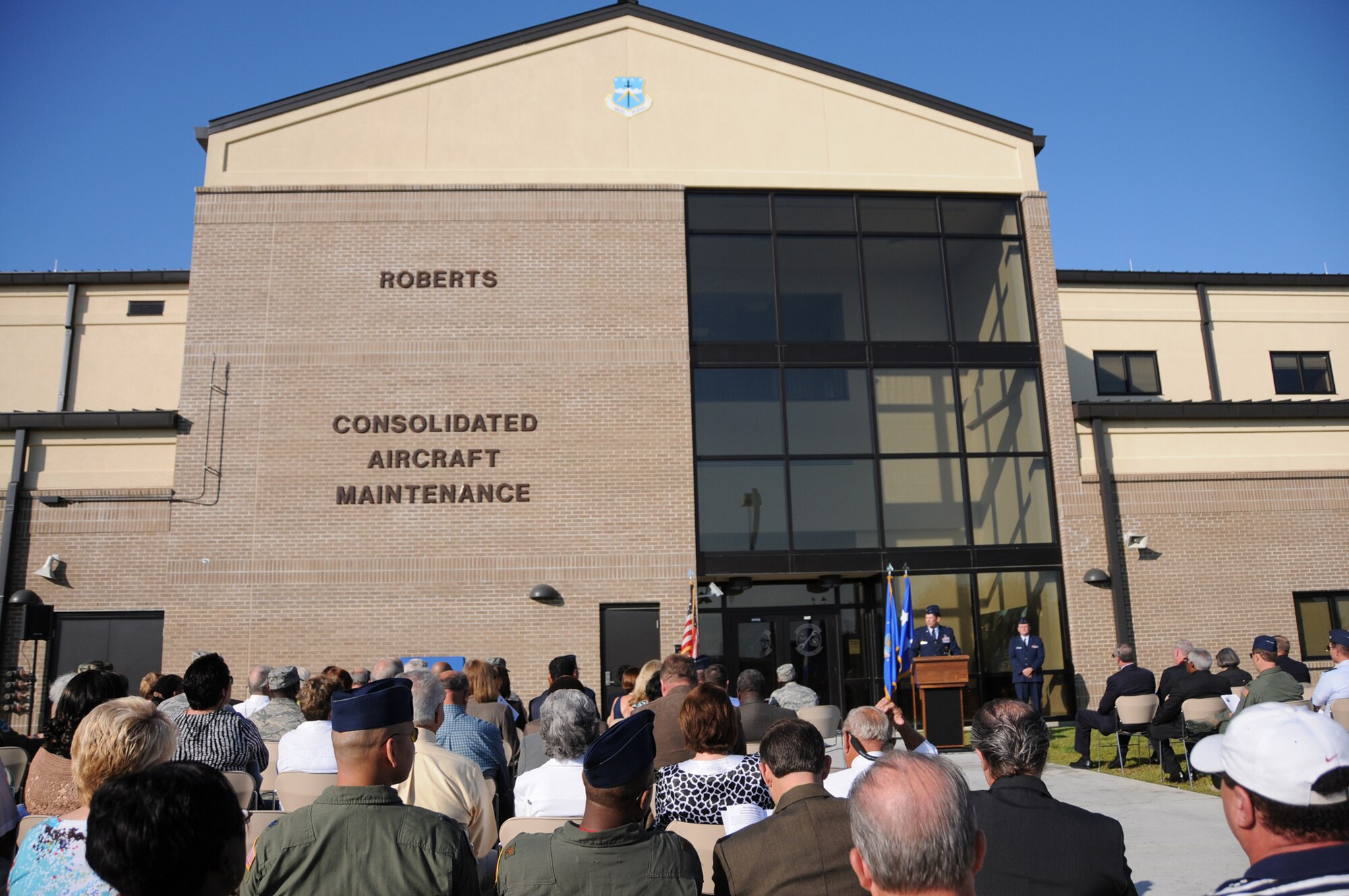 Team Keesler held a dedication ceremony of the Consolidated Aircraft Maintenance Facility named after Col. (Ret.) Lawrence Roberts who served as a Tuskegee Airman and adopted Biloxi, Miss. as his home. The $22.6 million facility will be used to  maintain the C-130J six-bladed composite  propeller, and many other significant maintenance capabilities. The Roberts' family, along with over 250 community and civic leaders, shared in the momentous occasion. (U.S. Air Force photo by Kemberly Groue)