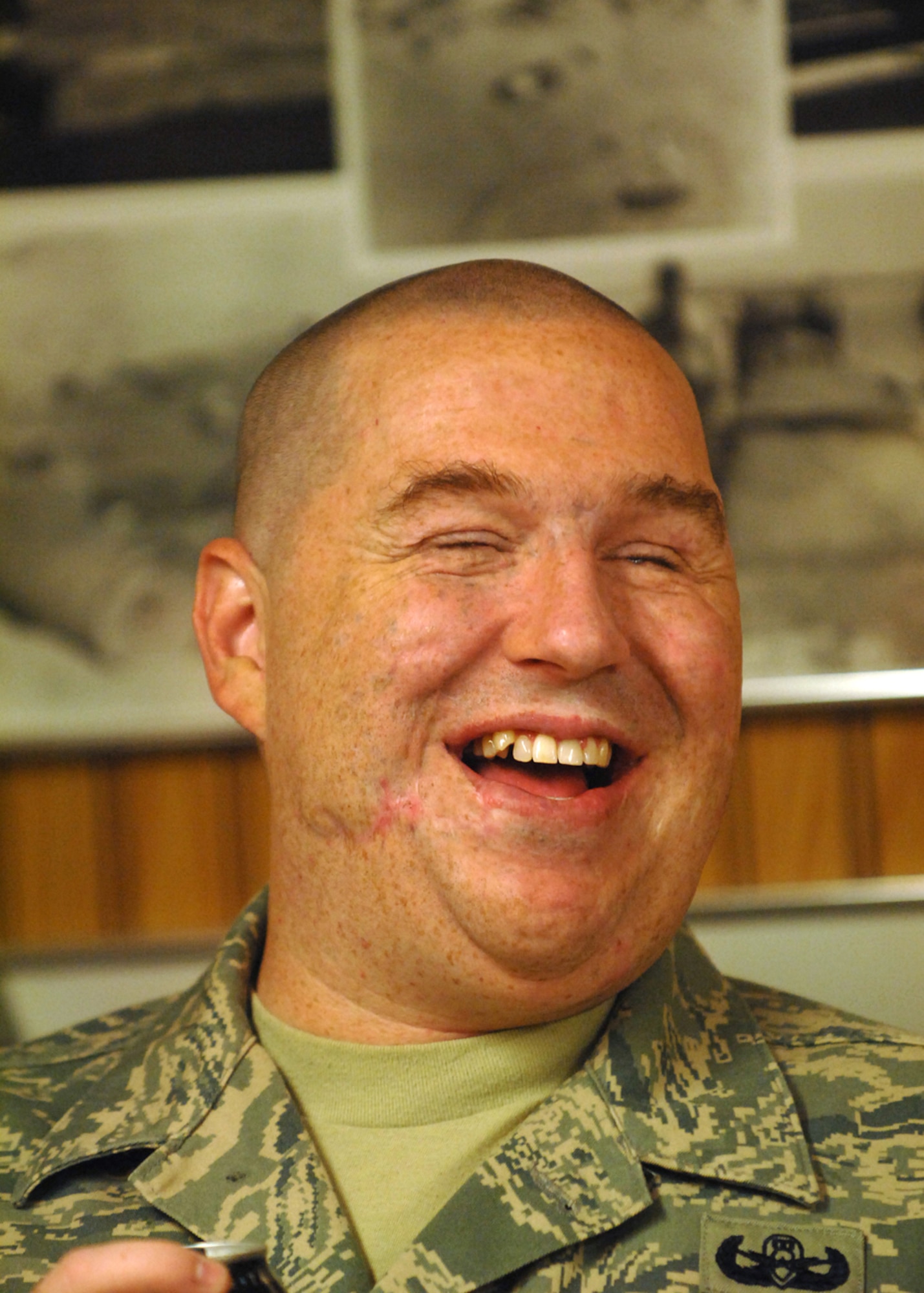 Tech. Sergeant Christopher "Matt" Slaydon, 56th Civil Engineer Squadron explosive ordinance disposal technician, laughs with friends and family at Luke Air Force Base Aug. 27, 2009 before heading out to detonate his final detonation as an active-duty Airman. (U.S. Air Force photo/Tech. Sgt. Jeffrey Wolfe)