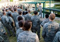 Air Force Basic Military Training trainees are given a safety brief on the proper way to cross obstacles at the BMT obstacle course. The obstacle course is completing during the fourth week of BMT. (Air Force photo/Benjamin Faske)