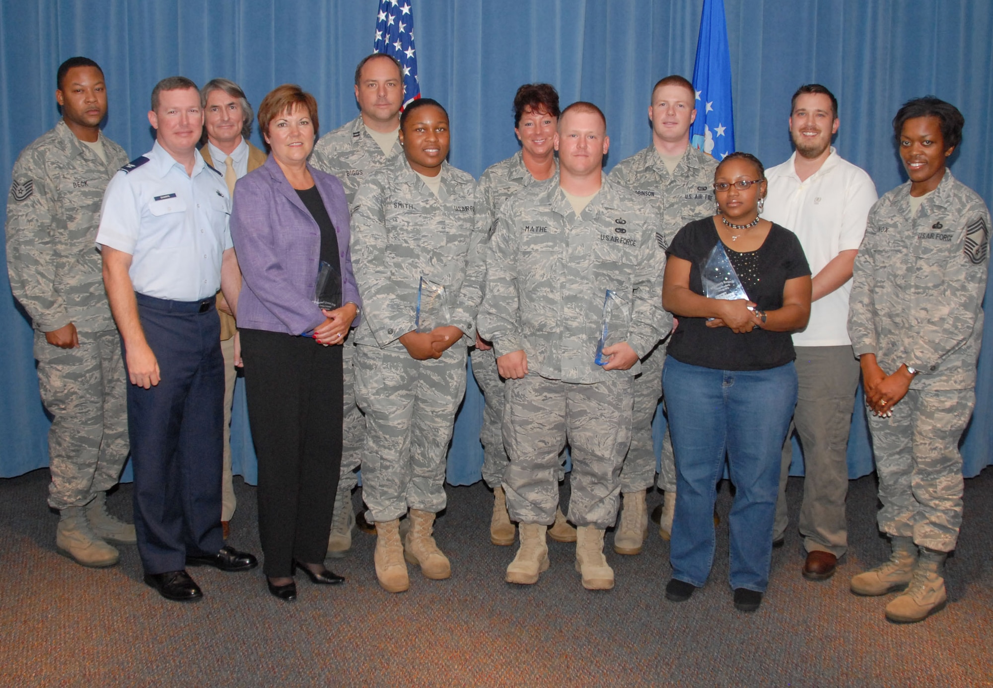 Back row from left: Tech. Sgt. Vincent Beck, Dr. John Ackerman, Capt. Michael Biggs, Senior Master Sgt. Rhonda Ball, Airman 1st Class Robert Robinson and Jeremy Abbott. Front row from left: 42nd Air Base Wing Vice Commander Col. Christopher Sharpe, Leigh Pfitzner, Airman 1st Class Feanja Smith, Tech. Sgt. Jonathan Mathe, Lakechia Starks and Chief Master Sgt. Shelia Knox. (U.S. Air Force photo/Roger Curry)