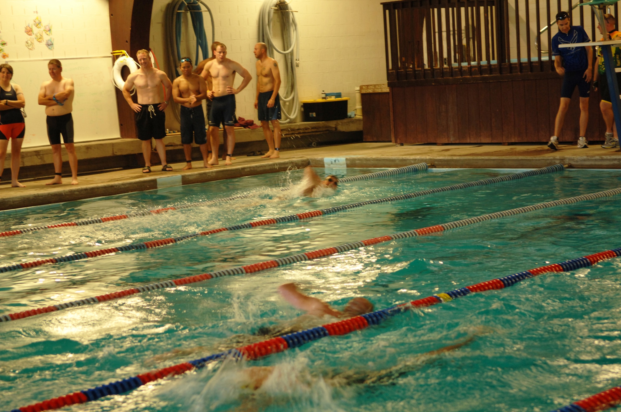 Participants began the mini-triathlon by swimming 400 meters at the Aurora Beck Center Pool Aug. 23.  (U.S. Air Force photo by Tech. Sgt. Shirley Henderson)