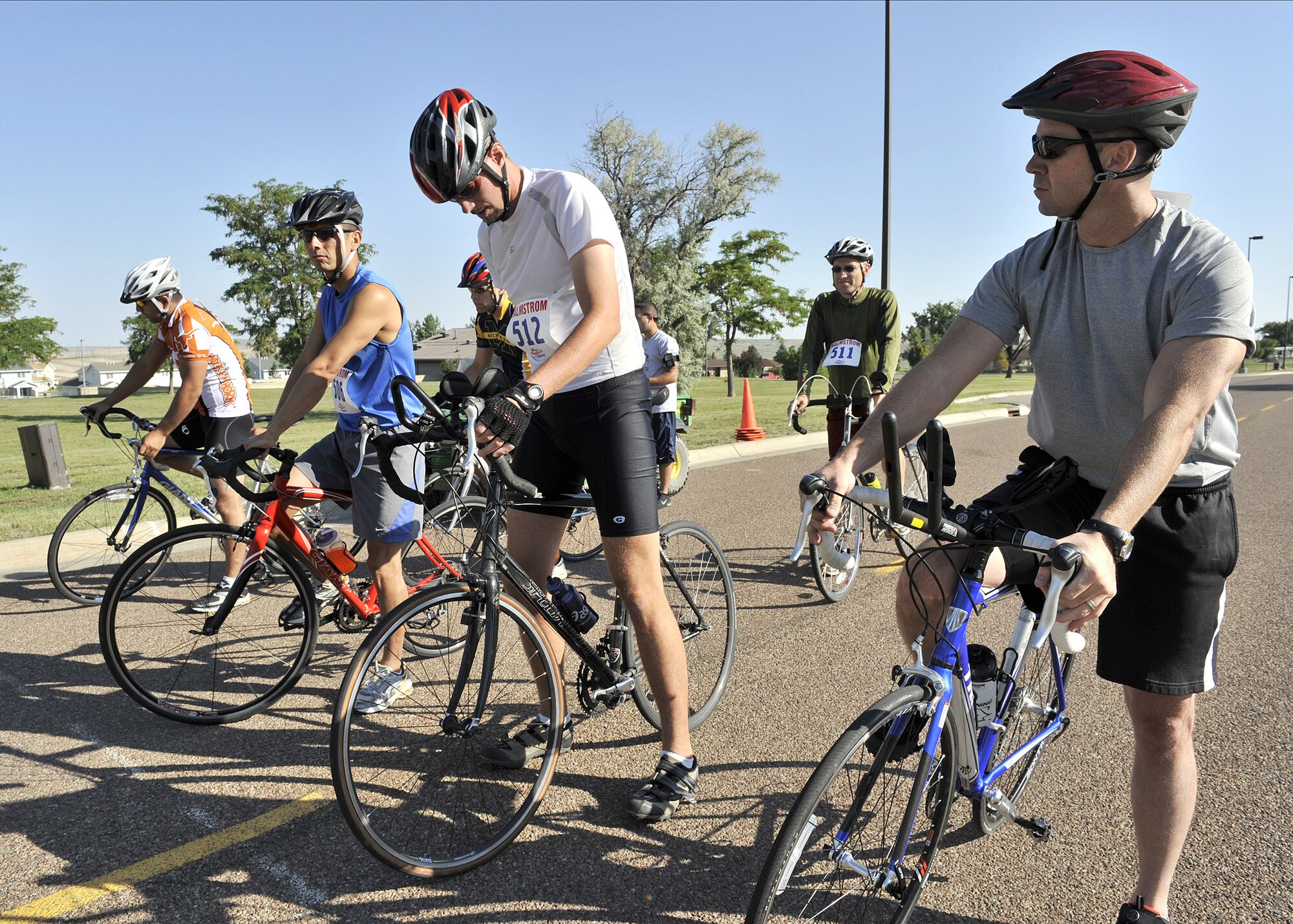 Riders Sergio Hernandez, Randy Kingfisher, Caleb Derby, Chris Crooks, Mark Bovingdon and Scott Knupp wait for the signal to begin racing in the base biathalon Aug. 21. (U.S. Air Force photo/John Turner)