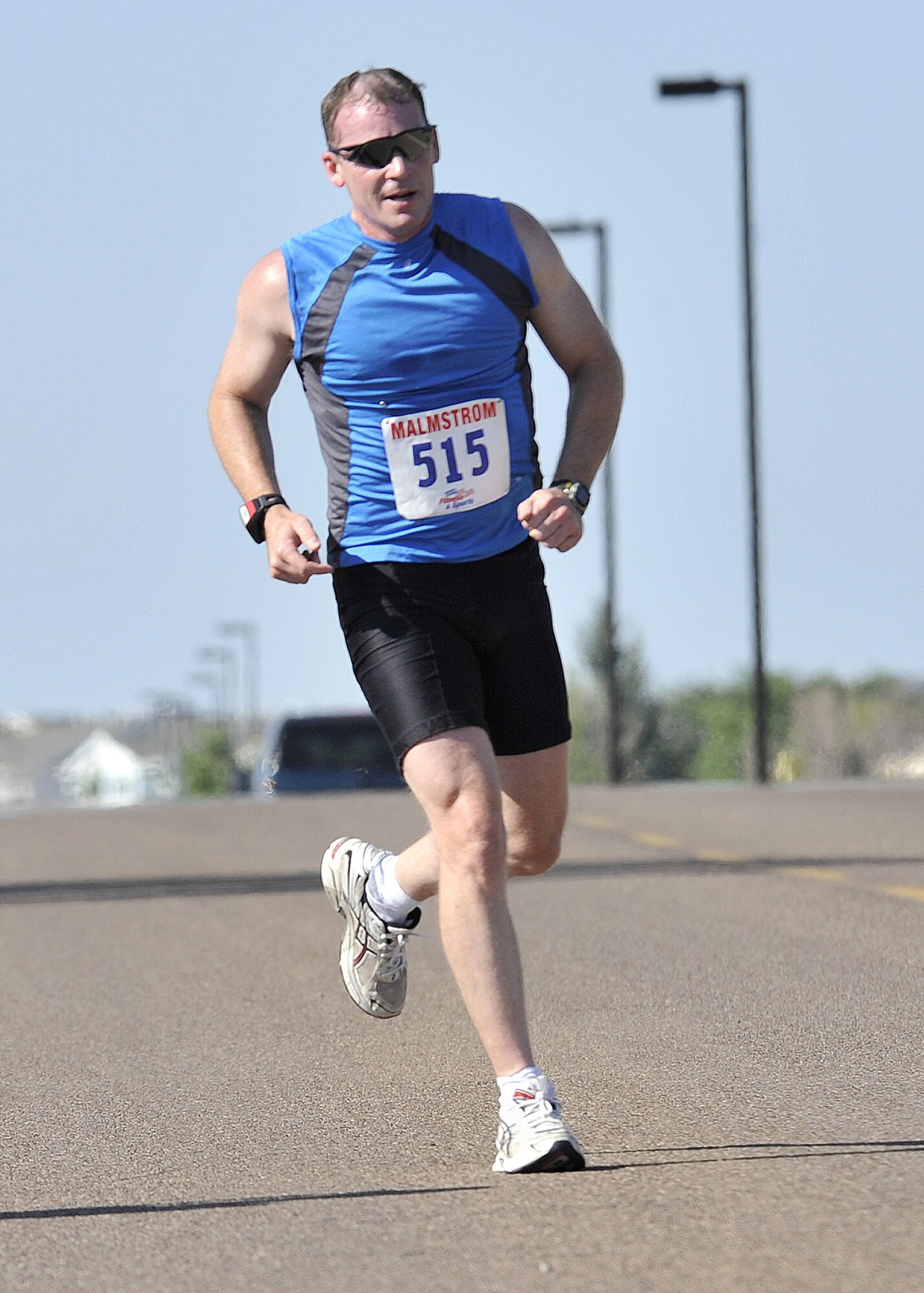 James Tanner begins the three mile running portion of the base biathalon after completing the 12-mile bicycle route Aug. 21. (U.S. Air Force photo/John Turner)