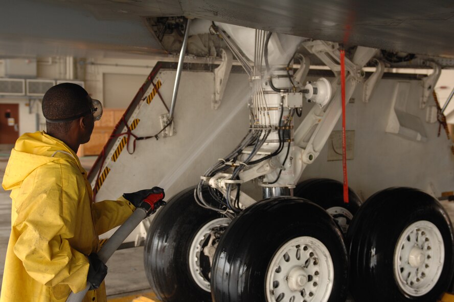 WHITEMAN AIR FORCE BASE, Mo. - Airman 1st Class Christopher Williams, a crew chief assigned to the 509th Aircraft Maintenance Squadron, washes a B-2, Spirit of South Carolina, during a wash Aug. 27. (U.S. Air Force photo/Senior Airman Jessica Snow)