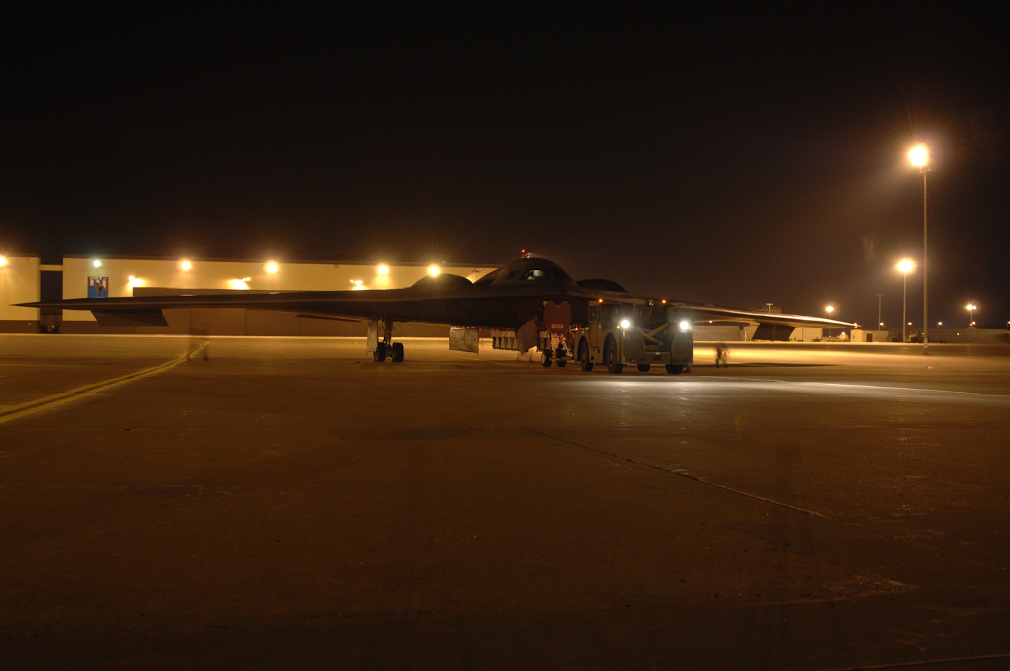 WHITEMAN AIR FORCE BASE, Mo. - Members of the 509th Aircraft Maintenance Squadron tow a B-2, Spirit of South Carolina, to the wash rack Aug. 27.  The B-2 is scheduled for a wash, which is required every 180 days and takes one to two days to complete.  (U.S. Air Force photo/Senior Airman Jessica Snow)