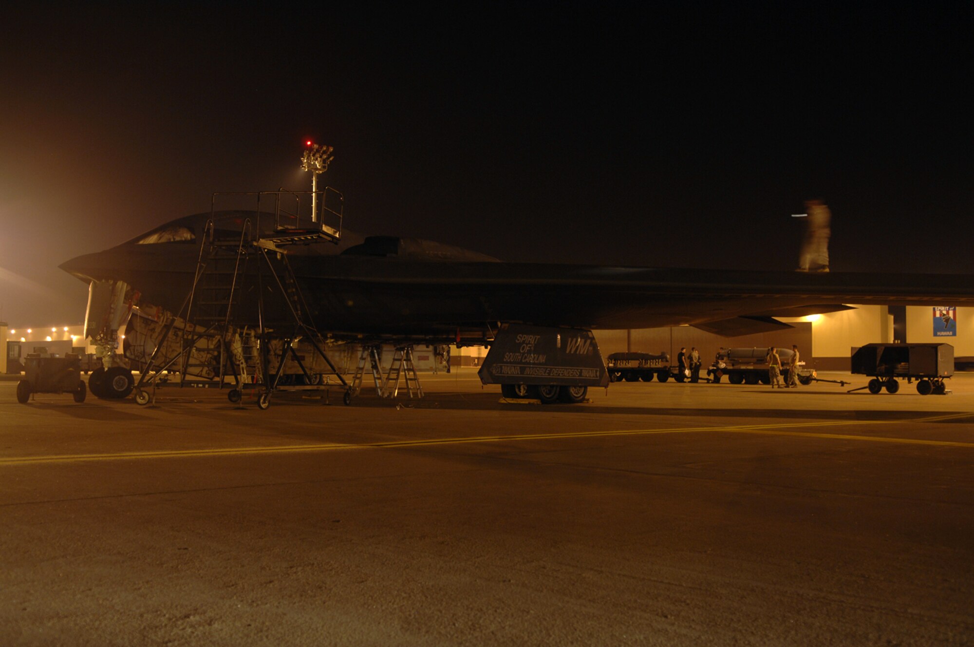 WHITEMAN AIR FORCE BASE, Mo. - Members of the 509th Aircraft Maintenance Squadron prepare a B-2, Spirit of South Carolina, to be towed on Aug. 27.  The B-2 is scheduled for a wash, which is required every 180 days and takes one to two days to complete.  (U.S. Air Force photo/Senior Airman Jessica Snow)