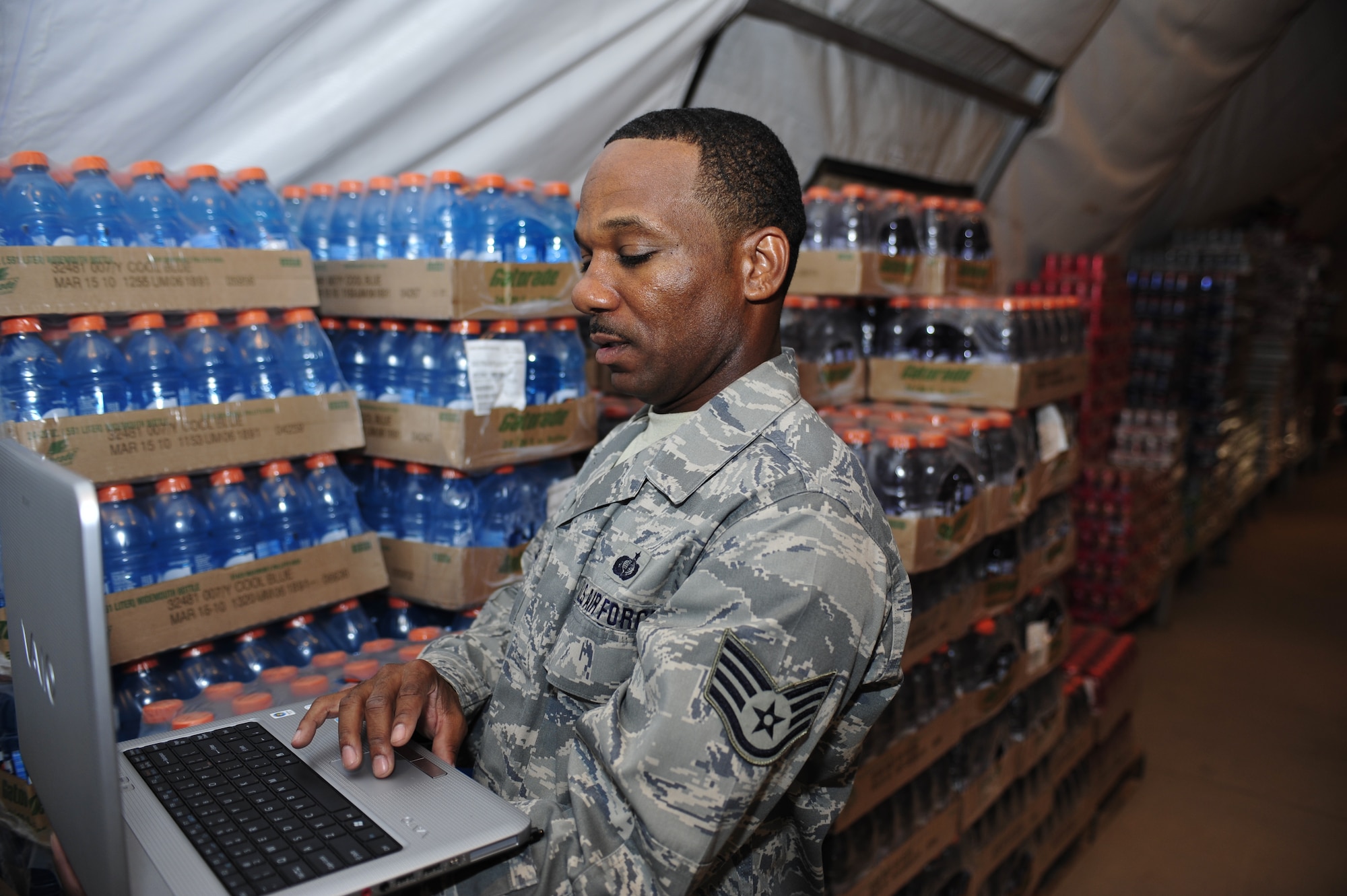 SOUTHWEST ASIA -Staff Sgt. Marvin Daniels, 380th Expeditionary Force Support Squadron, reviews the flight line storage room inventory Aug. 21. Sergeant Daniels is deployed from the 187th Fighter Wing, and grew up in Montgomery, Ala.  (U.S. Air Force photo/Tech. Sgt. Charles Larkin Sr)