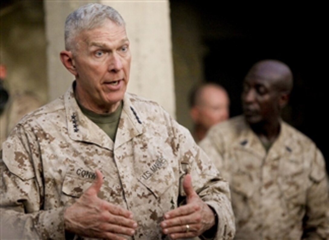 Commandant of the Marine Corps Gen. James Conway speaks with Marines of 1st Battalion, 5th Marine Regiment at Patrol Base Jaker, Nawa district, Helmand province, Afghanistan, on Aug. 24, 2009.  The Marines are deployed with Regimental Combat Team 3, to conduct counterinsurgency operations in partnership with Afghan security forces in southern Afghanistan.  