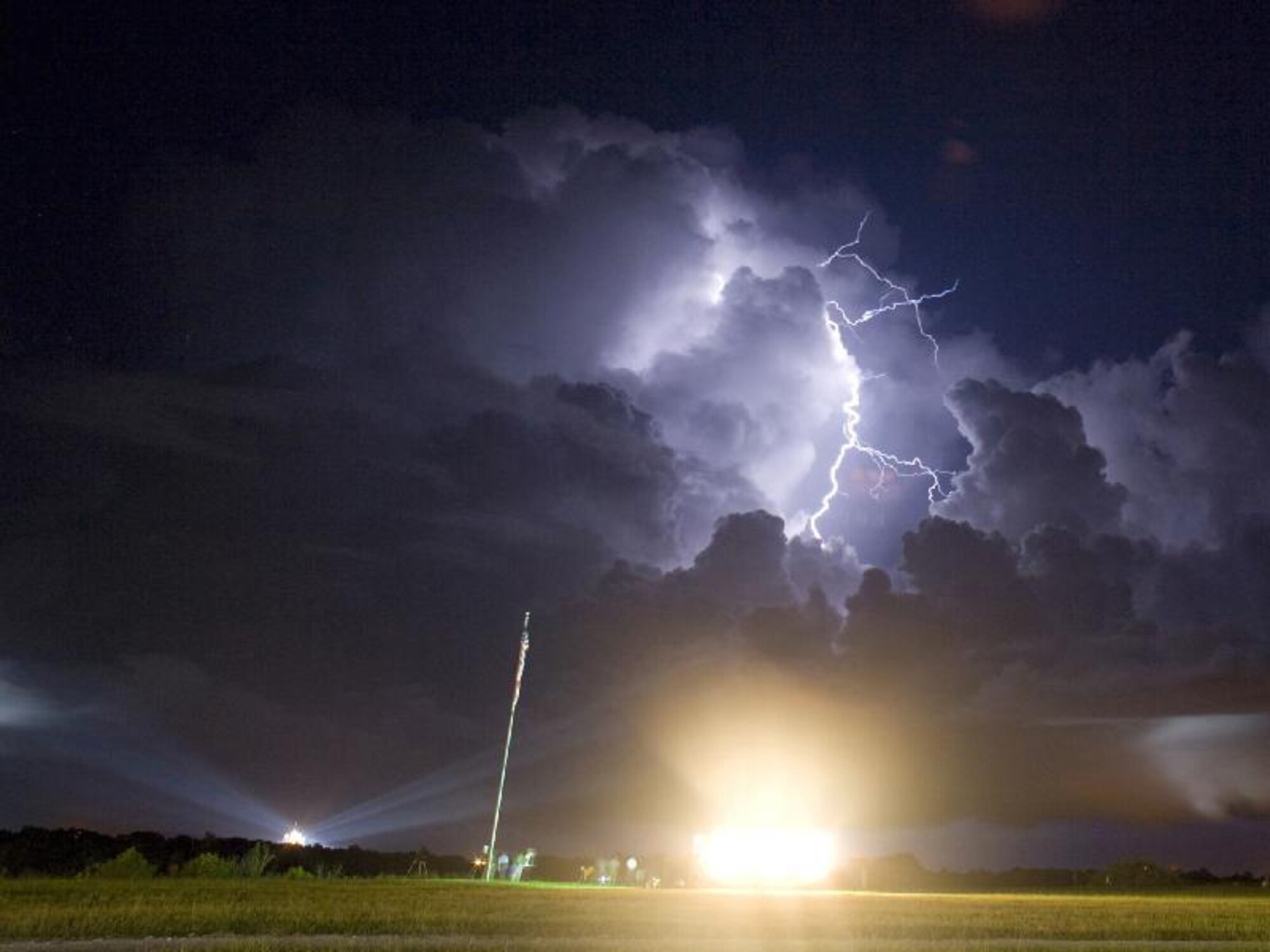 PATRICK AIR FORCE BASE, Fla. - As Space Shuttle Discovery glowed in the midnight upon lift of from NASA's Kennedy Space Center to the International Space Station Aug. 28 at 11:59 p.m. local time, Air Force Reservists from the 920th Rescue Wing here were prepared to commence a large-scale rescue at an infinitesimal sign of any danger to the crew members of Space Transport System 128. (NASA Photo)