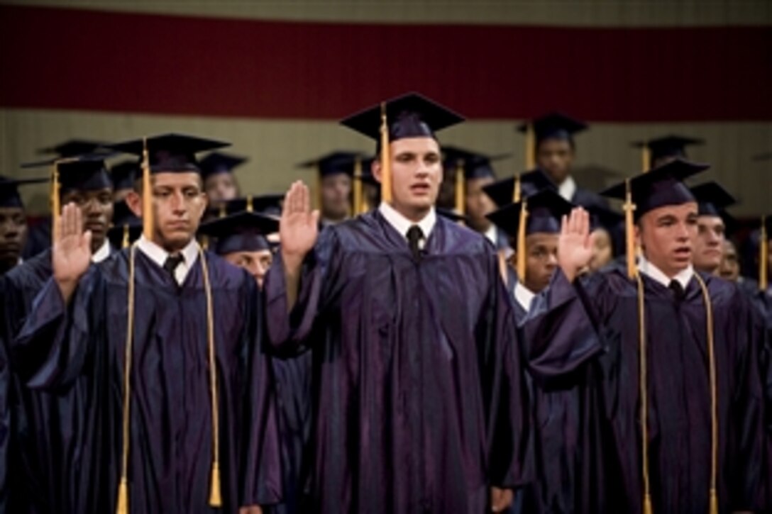 Three graduates of the New Jersey National Guard Youth ChalleNGe Academy take the oath enlisting them in the New Jersey National Guard during their graduation in Trenton, N.J., Aug. 29, 2009. The program identifies New Jersey youth who have dropped out of high school and uses military style training to enhance their life skills and employment potential.




