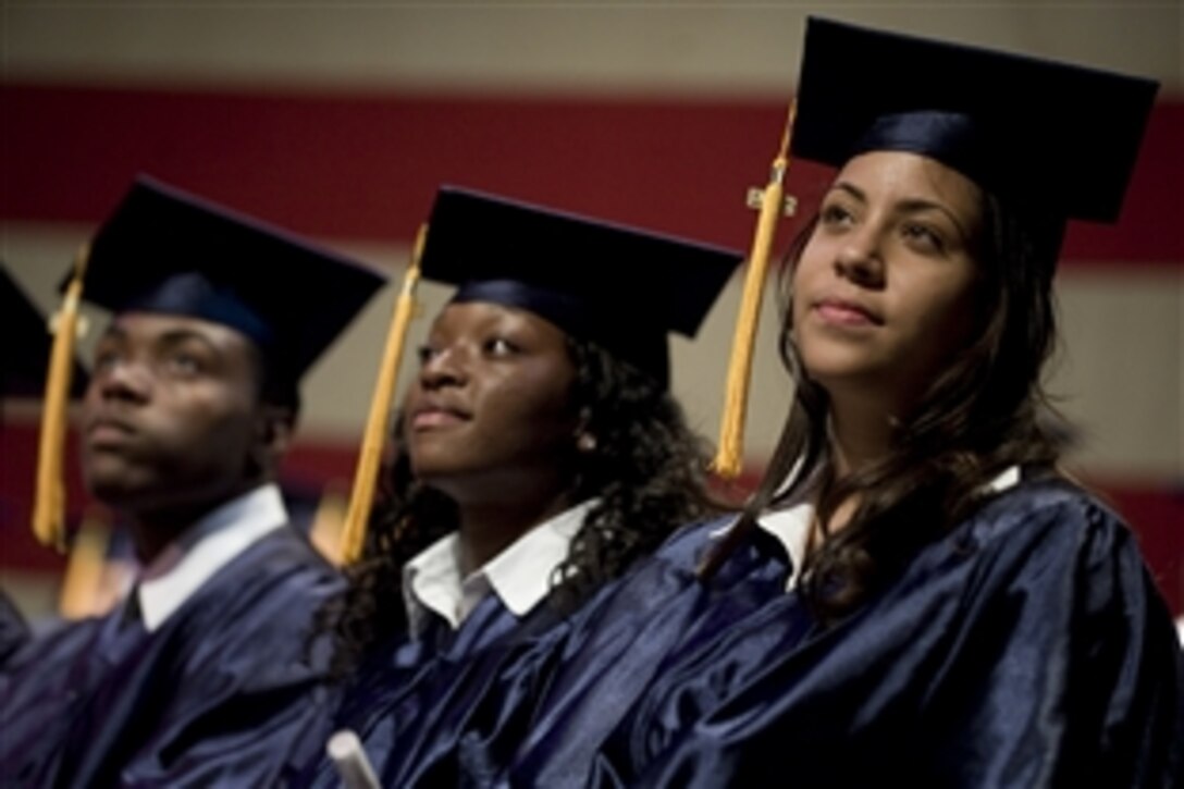 Jameel Andrews, Joana Amicar and Lianabel Amaro prepare to graduate from the New Jersey National Guard Youth ChalleNGe Academy in Trenton, N.J., Aug. 29, 2009. 

