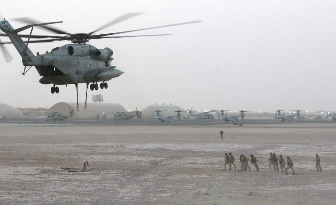 A CH-53E Super Stallion from Marine Medium Tiltrotor Squadron 263 (Reinforced), 22nd Marine Expeditionary Unit, detaches a two-ton barrier during a Helicopter Support Team airlift training evolution at Udairi Army Airfield, Kuwait Aug. 30, 2009. The 22nd MEU is ashore in Kuwait conducting sustainment training while serving as the theater reserve force for U.S. Central Command.