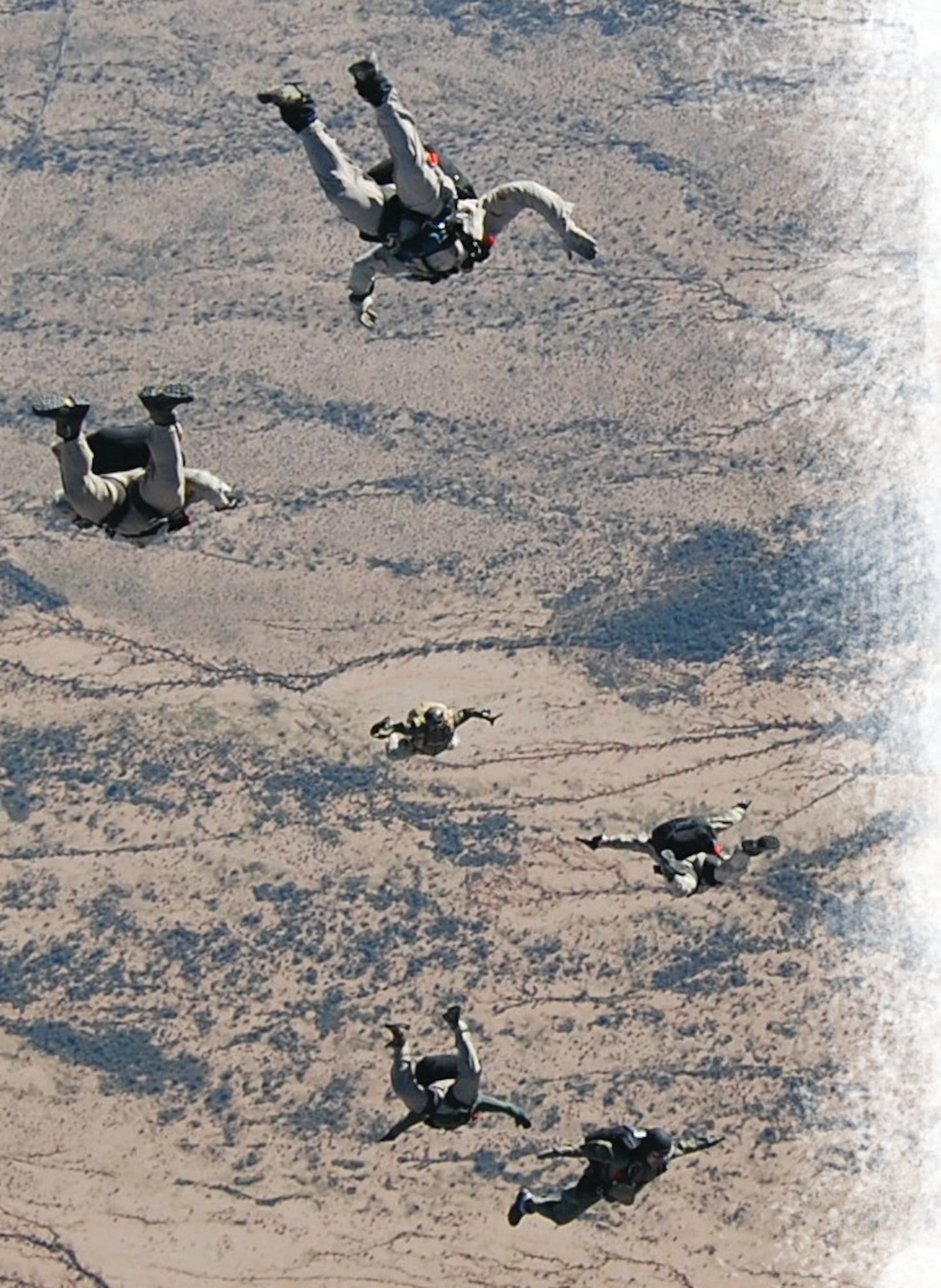 Pararescuemen from the 306th Rescue Squadron at Davis-Monthan Air Force Base train in the desert near Tucson, Arizona. Approximately 25% of the Airmen in the squadron are Active Guard Reserve). (U.S. Air Force photo)