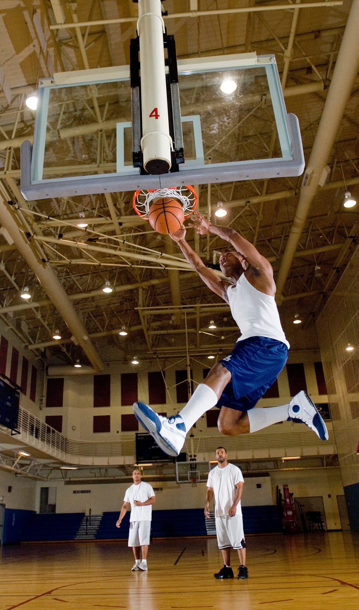 KUNSAN AIR BASE, Republic of Korea -- James Watts, 8th Maintenance Squadron, dunks a basketball during tryouts for the men's varsity team here Aug. 27. Twenty Airmen competed for a spot on the team to compete against other bases throughout the Republic of Korea. (U.S. Air Force photo/Senior Airman Jonathan Steffen)