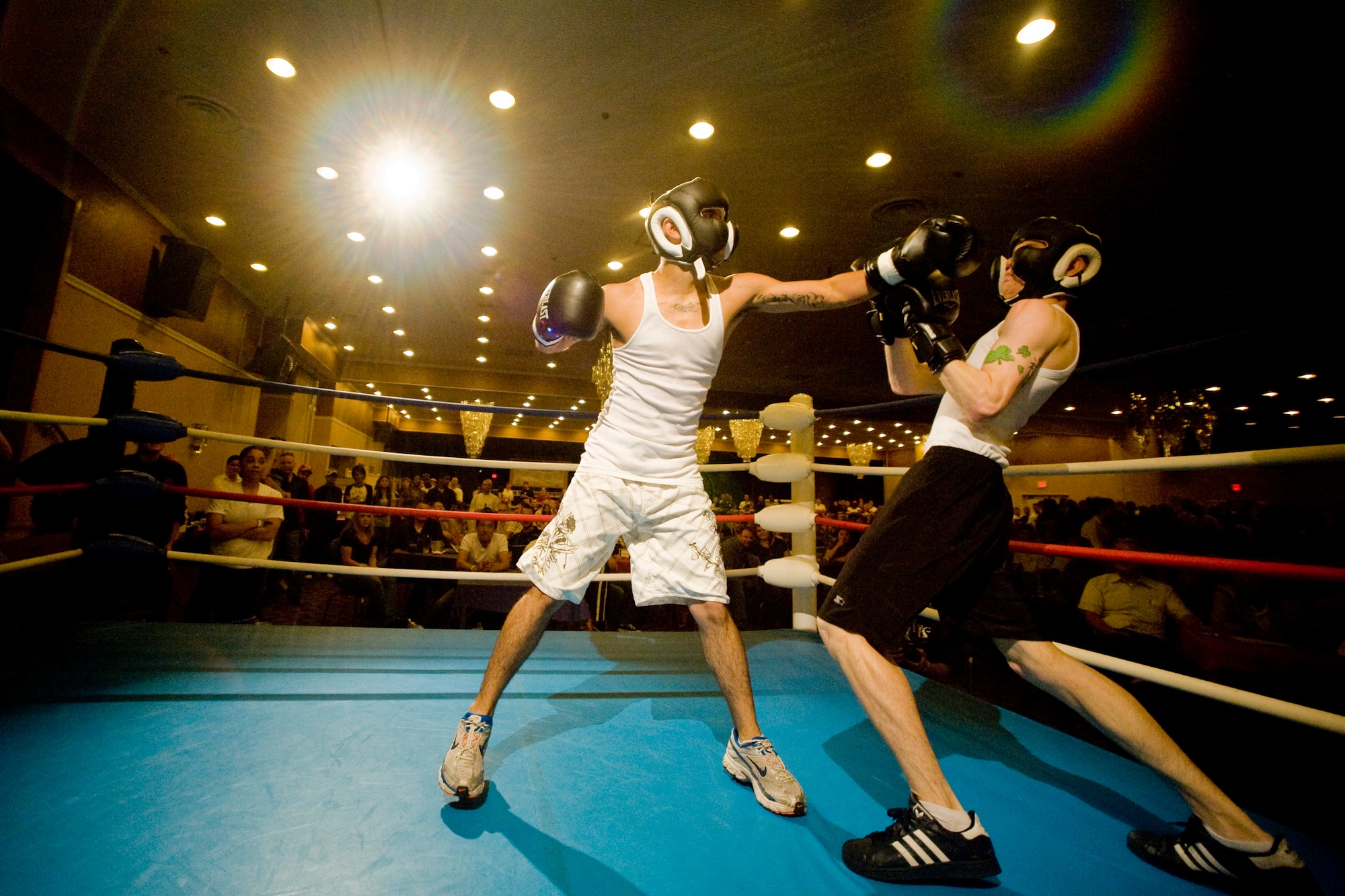 MISAWA AIR BASE, Japan -- Rick Perez throws a left jab toward James Huber during a lightweight Friday Night Fight Night bout Aug. 28. The event allowed 24 fighters a chance to prove their skills in the ring. (U.S. Air Force photo/Senior Airman Jamal D. Sutter)