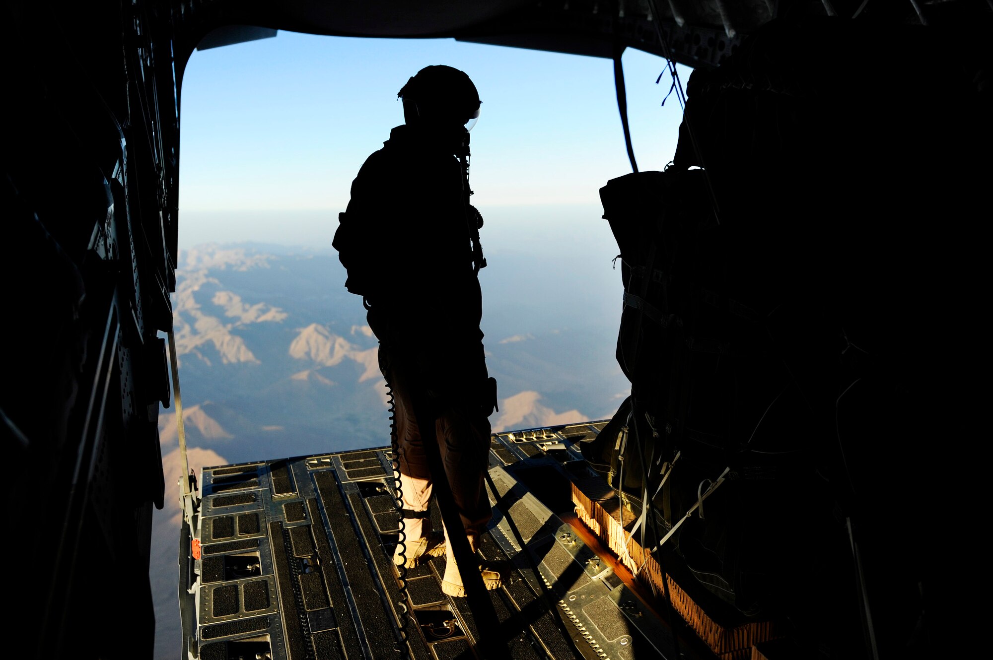 Senior Airman Bryce Kester inspects pallets of cargo that will be dropped from a C-17 Globemaster III to a forward operating base in Afghanistan, Aug. 27, 2009, in support of Operation Enduring Freedom.  Airman Kester is a loadmaster from the 817th Expeditionary Airlift Squadron, and deployed from McChord Air Force Base, Wash.  (U.S. Air Force photo/Staff Sgt. Michael B. Keller)