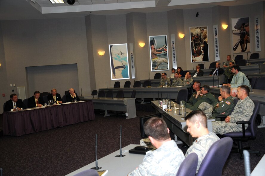 Retired Col. Dennis Carpenter (left) talks about his experience in coordinating air refueling for Operations Desert Shield and Desert Storm in 1990-91 as part of the Tanker Living Legends Speaker Series on Aug. 28, 2009, at the Global Reach Planning Center at Scott Air Force Base Ill..  Next to Colonel Carpenter is retired Lt. Col. Scott Hente. In total there were four panel members for the speaker series put on by Air Mobility Command. (U.S. Air Force Photo/Tech. Sgt. Scott T. Sturkol) 