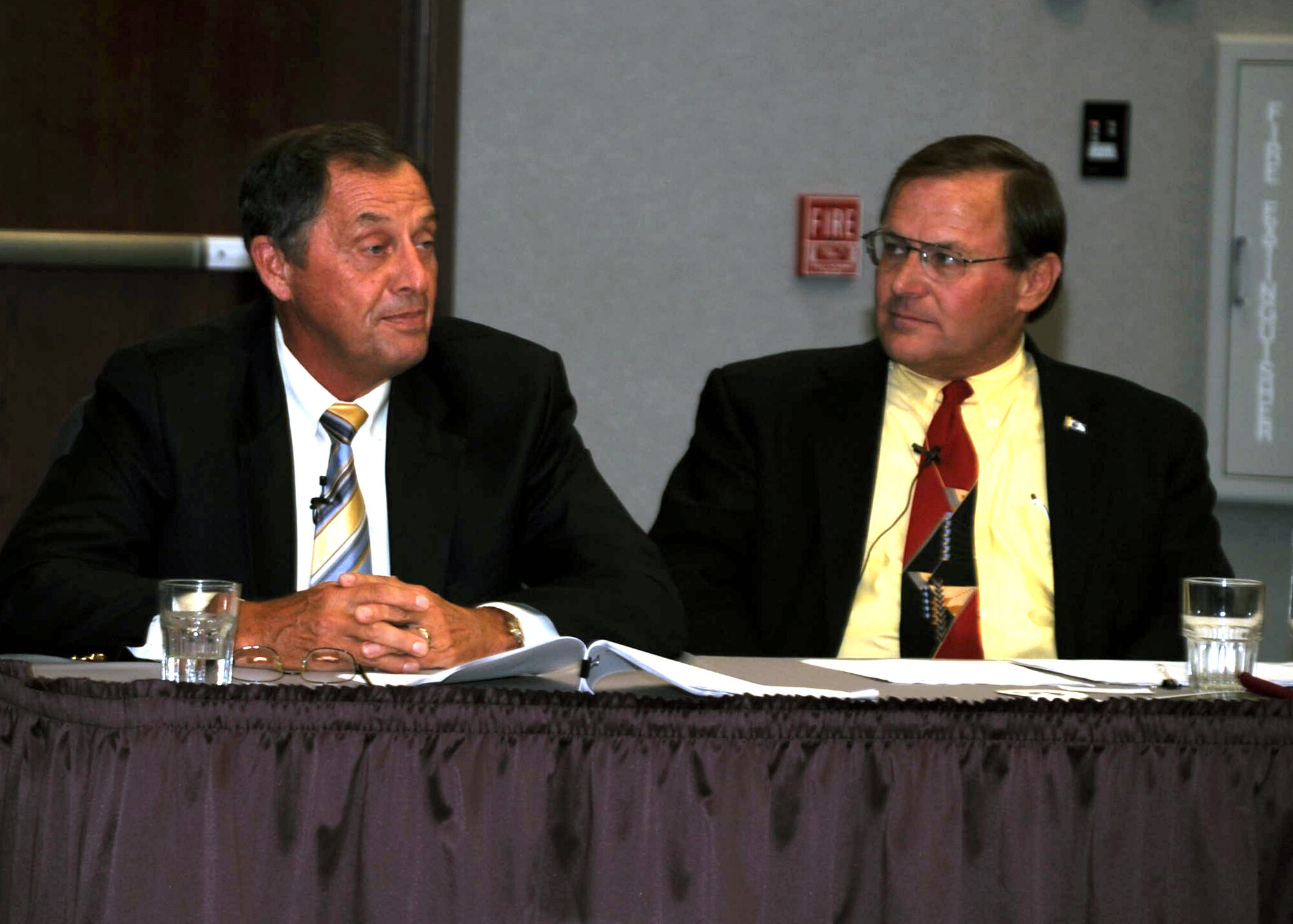 Retired Col. Dennis Carpenter (left) talks about his experience in coordinating air refueling for Operations Desert Shield and Desert Storm in 1990-91 as part of the Tanker Living Legends Speaker Series on Aug. 28, 2009, at the Global Reach Planning Center at Scott Air Force Base Ill..  Next to Colonel Carpenter is retired Lt. Col. Scott Hente. In total there were four panel members for the speaker series put on by Air Mobility Command. (U.S. Air Force Photo/Tech. Sgt. Scott T. Sturkol) 