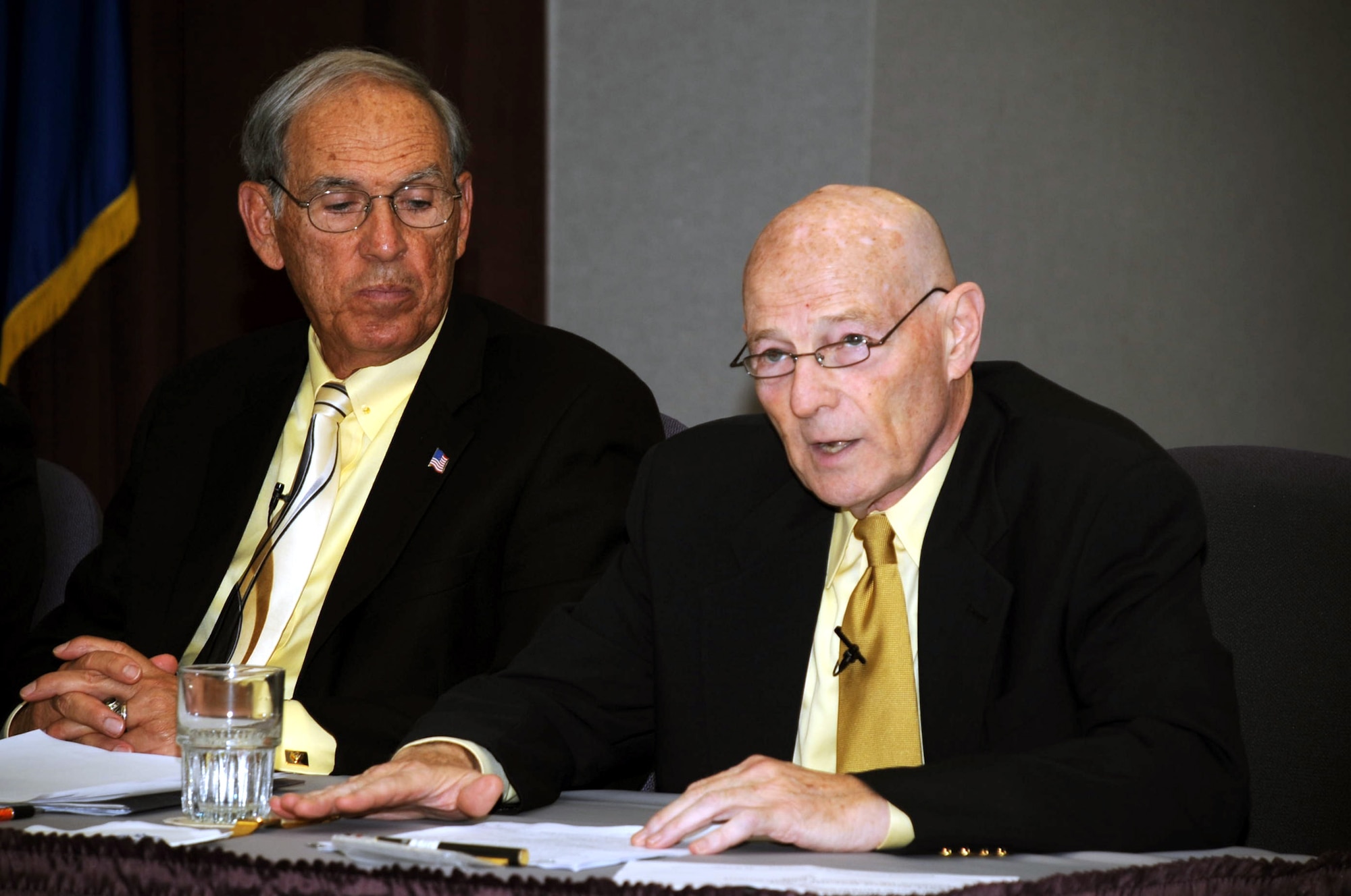 Retired Brig. Gen. Kenneth F. Keller (right) talks about his experience in coordinating air refueling for Operations Desert Shield and Desert Storm in 1990-91 as part of the Tanker Living Legends Speaker Series on Aug. 28, 2009, at the Global Reach Planning Center at Scott Air Force Base Ill..  Sitting to the left is retired Lt. Gen. Pat Caruana.  In total there were four panel members for the speaker series put on by Air Mobility Command. (U.S. Air Force Photo/Tech. Sgt. Scott T. Sturkol) 