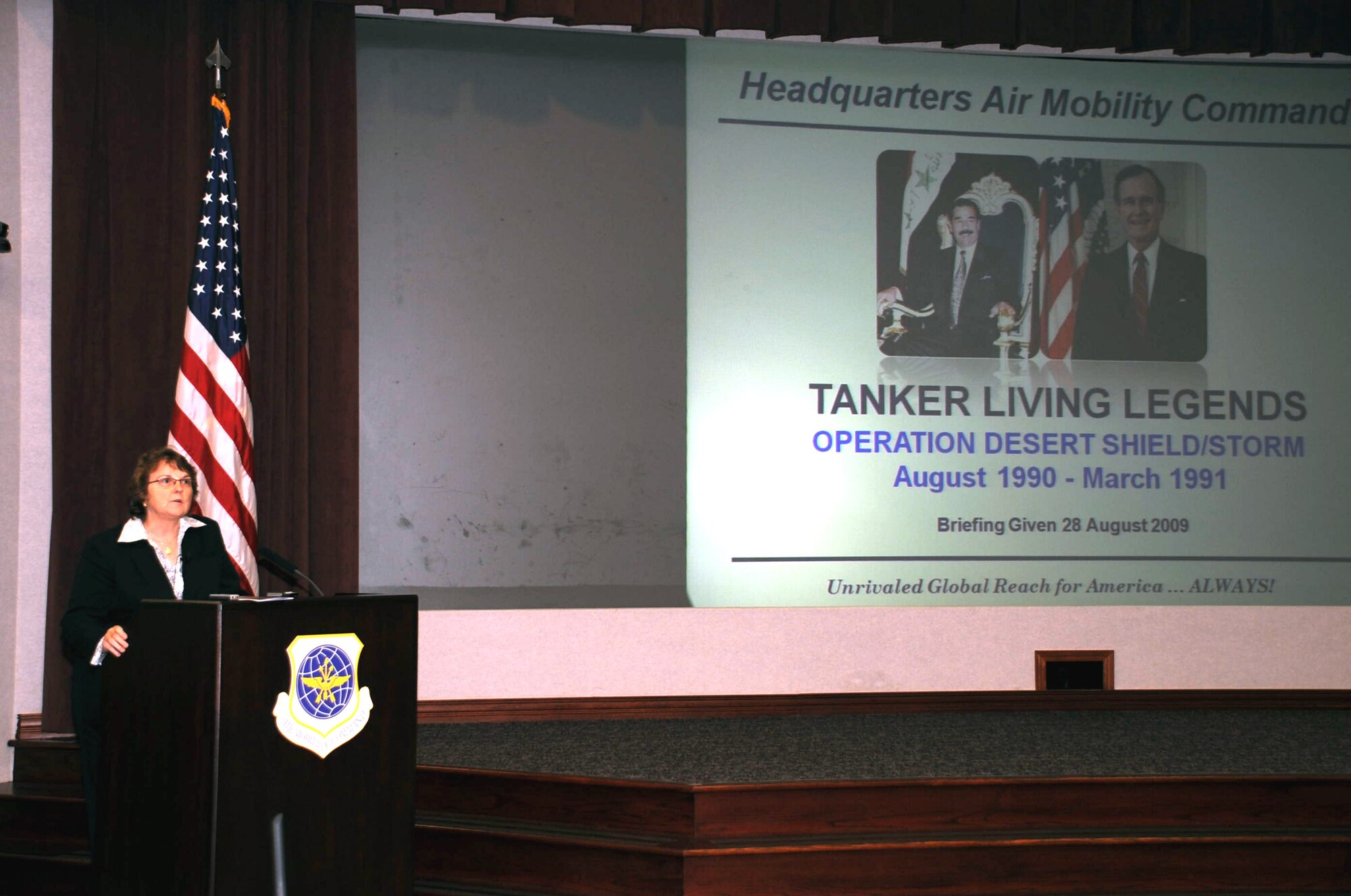 Ms. Gail Wojtowicz, director of staff for Air Mobility Command Headquarters at Scott Air Force Base, Ill., introduces the panel members for a session of the Tanker Living Legends speaker series in the Global Reach Planning Center at Scott on Aug. 28, 2009.  Among those participating in the panel were retired Col. Dennis D. Carpenter, retired Lt. Col. Scott Hente, retired Lt. Gen. Pat Caruana, and retired Brig. Gen. Kenneth F. Keller.  All four of the retired officers were on hand to recall their experiences in coordinating air refueling efforts for Operations Desert Shield and Desert Storm in 1990-91.  (U.S. Air Force Photo/Tech. Sgt. Scott T. Sturkol) 