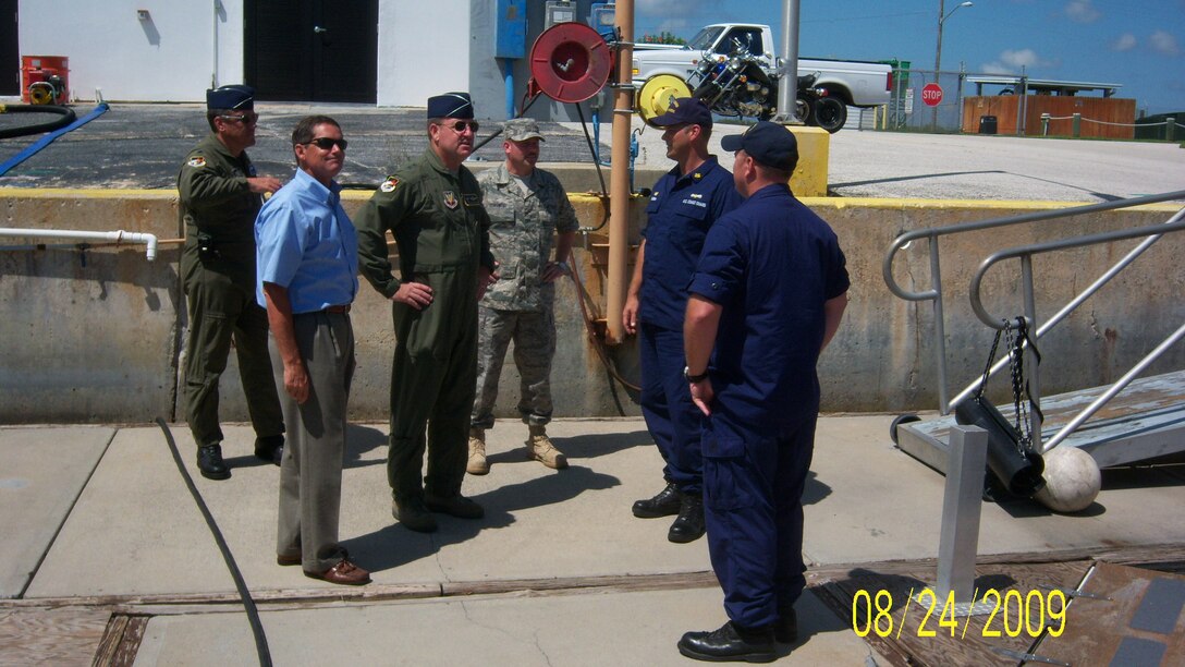 Maj. Gen. Hank Morrow, 1st Air Force Commander, Lt. Col Andy Lasher, and Chief Master Sgt David Zoromski visit with Chief Warrant Officer Three James A. Dubea, commanding officer, and Petty Officer 1st Class Marshall Riff, Operations Petty Officer. Gen. Morrow visited the U.S. Coast Guard Station Port Canaveral to express his thanks to the team for their continued support of the JTF-Space Transportation System mission.