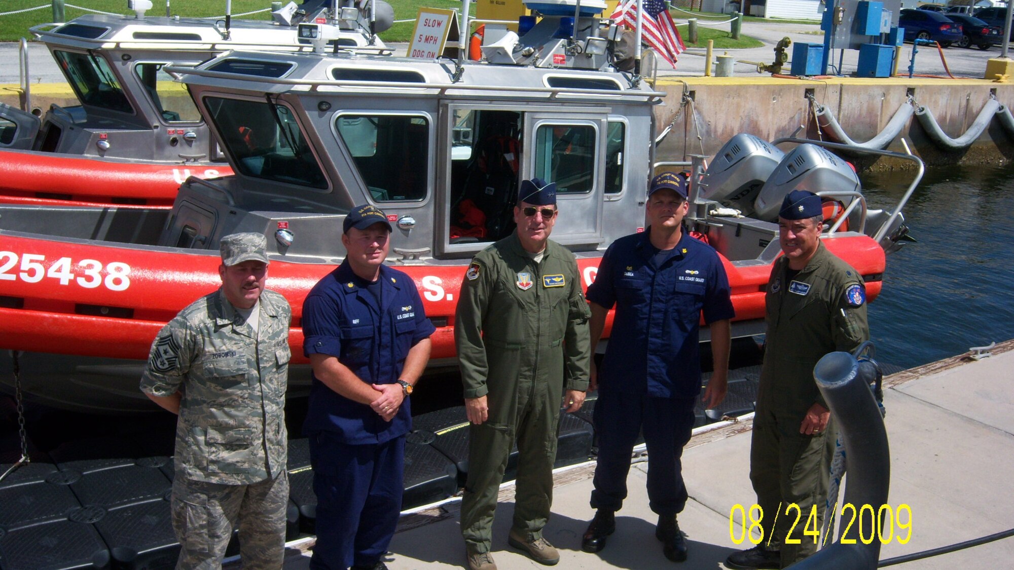 Maj. Gen. Hank Morrow, 1st Air Force Commander, Lt. Col Andy Lasher, and Chief Master Sgt David Zoromski visit with Chief Warrant Officer Three James A. Dubea, commanding officer, and Petty Officer 1st Class Marshall Riff, Operations Petty Officer. Gen. Morrow visited the U.S. Coast Guard Station Port Canaveral to express his thanks to the team for their continued support of the JTF-Space Transportation System mission.