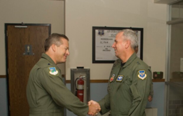 Maj. Gen. Floyd Carpenter, 8th Air Force commander, visited the 102nd Air Operations Group Aug. 21-22.  Pictured above, General Carpenter is greeted by Lt. Col. Richard Sweeten, 102nd Air Operations Group commander. The general was given a briefing on the AOG?s mission that supports the 608th Air and Space Operations Center at Barksdale AFB, La., and then a tour of the facilities. Carpenter said that with cuts to active duty manning, he needs Otis now more than ever to support his command and control requirements for the Global Strike mission. General Carpenter is also the Joint Functional Component Commander for Global Strike, United States Strategic Command.
(U.S. Air Force photo/Master Sgt. Aaron Smith)