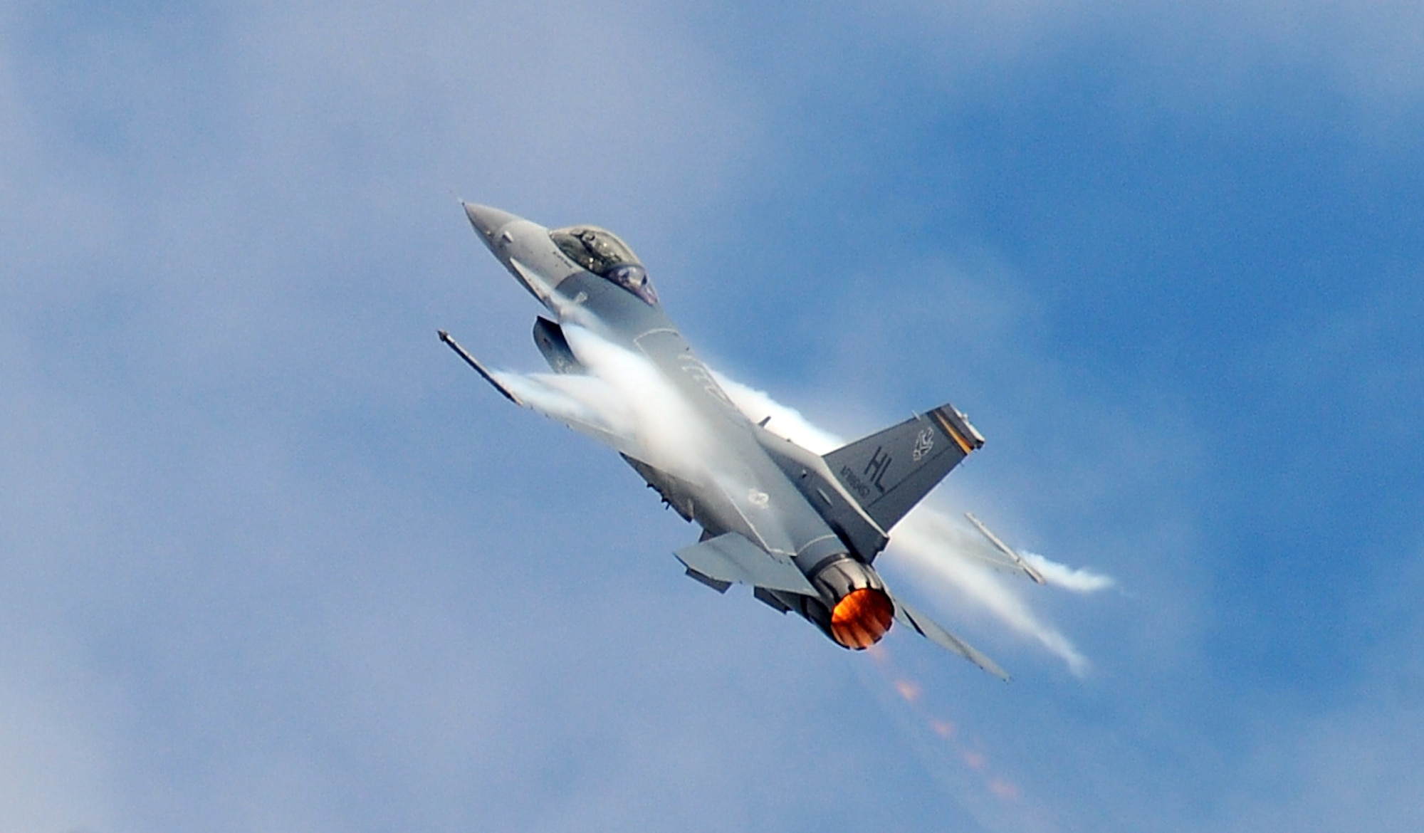 OFFUTT AIR FORCE BASE Neb. -- An F-16 Fighting Falcon takes to the air as part of the 2009 Defenders of Freedom Open House and Air Show here Aug. 29 - 30. The F-16 is a compact, multi-role fighter that can locate targets in all weather conditions and detect low flying aircraft in radar ground clutter. U.S. Air Force Photo by Josh Plueger