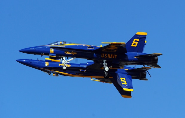 OFFUTT AIR FORCE BASE Neb. -- The U.S. Navy's Blue Angels, an F-18 demonstration team, perform breathtaking stunts during the 2009 Defenders of Freedom Open House and Air Show here Aug. 29 - 30. U.S. Air Force Photo by Josh Plueger