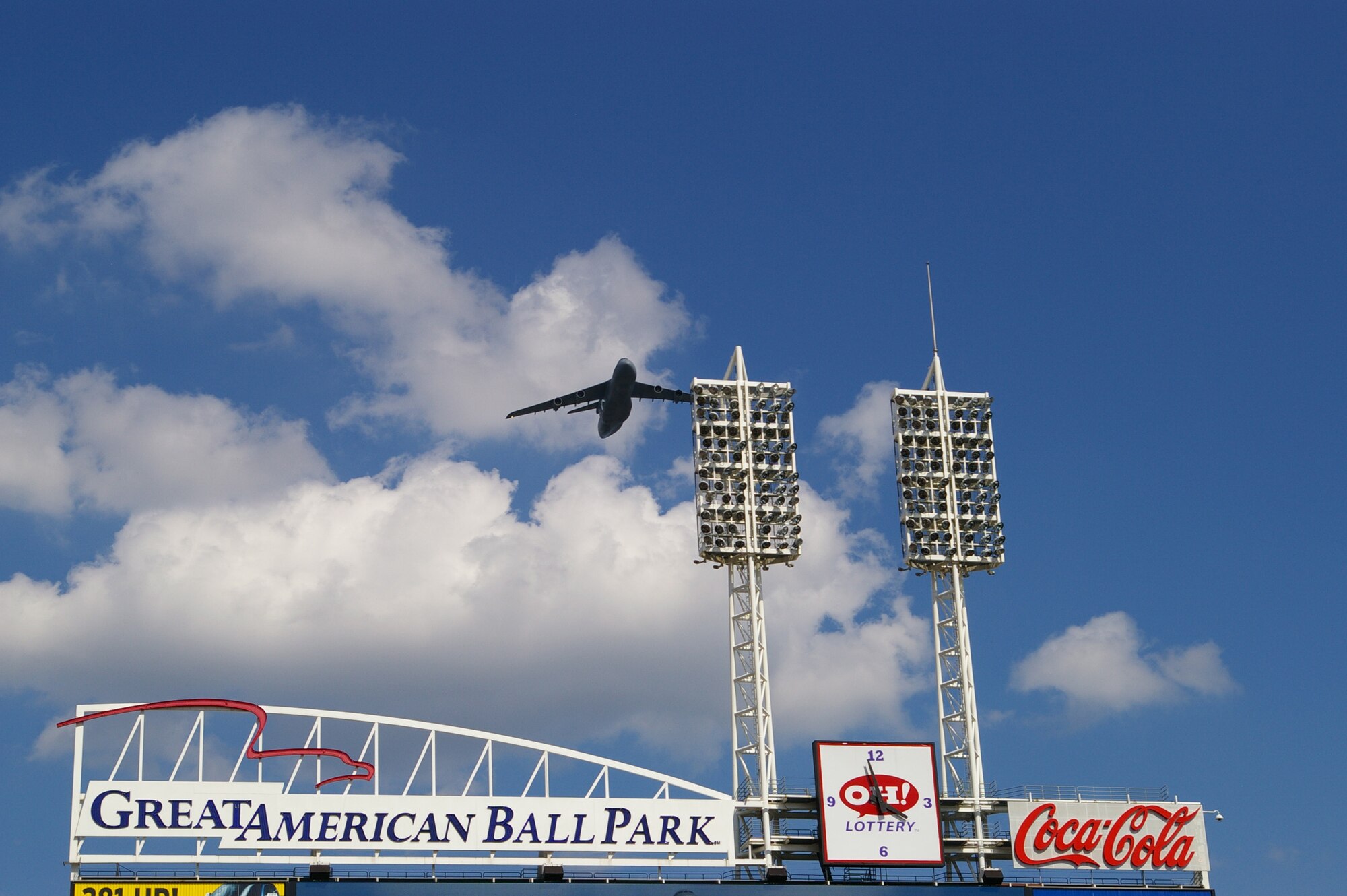 CINCINNATI, Ohio - A 445th Airlift Wing C-5 Galaxy performs a flyover at the Great American Ball Park, home of the Cincinnati Reds, Aug. 29, 2009. Two reservists from 445th Airlift Wing were also recognized at the pregame ceremony for recently returning from a deployment.  The Saturday game was Cincinnati Reds Military Appreciation Day. (Air Force photo/Laura Darden)  