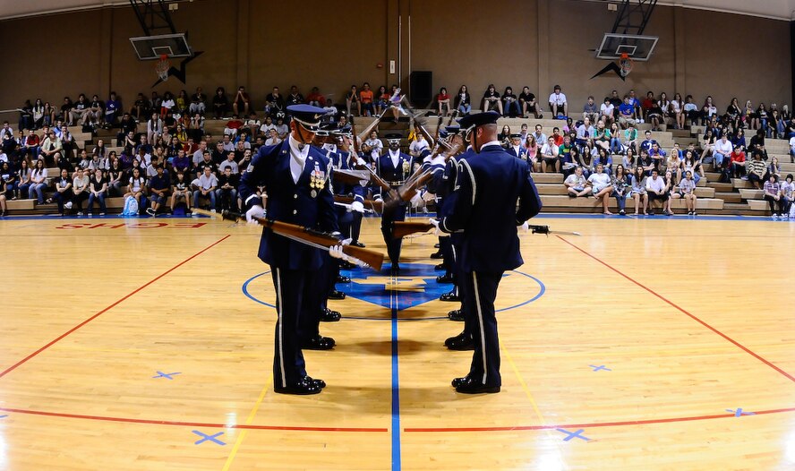 The United States Air Force Honor Guard Drill Team performs Aug. 28 at Eau Gallie High School in Melbourne, Fla. During the Florida tour, the Drill Team will be performing at military installations and local schools and communities to help raise awareness of the Air Force mission. (U.S. Air Force photo by Senior Airman Alexandre Montes)  