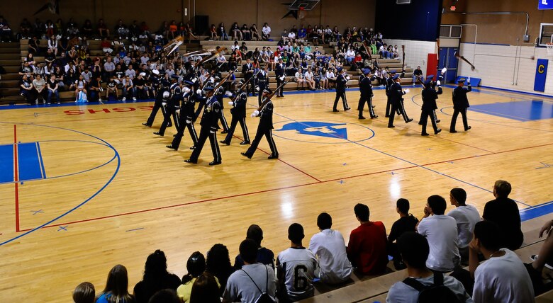 The United States Air Force Honor Guard Drill Team performs Aug. 28 at Eau Gallie High School in Melbourne, Fla. During the Florida tour, the Drill Team will be performing at military installations and local schools and communities to help raise awareness of the Air Force mission. (U.S. Air Force photo by Senior Airman Alexandre Montes)  