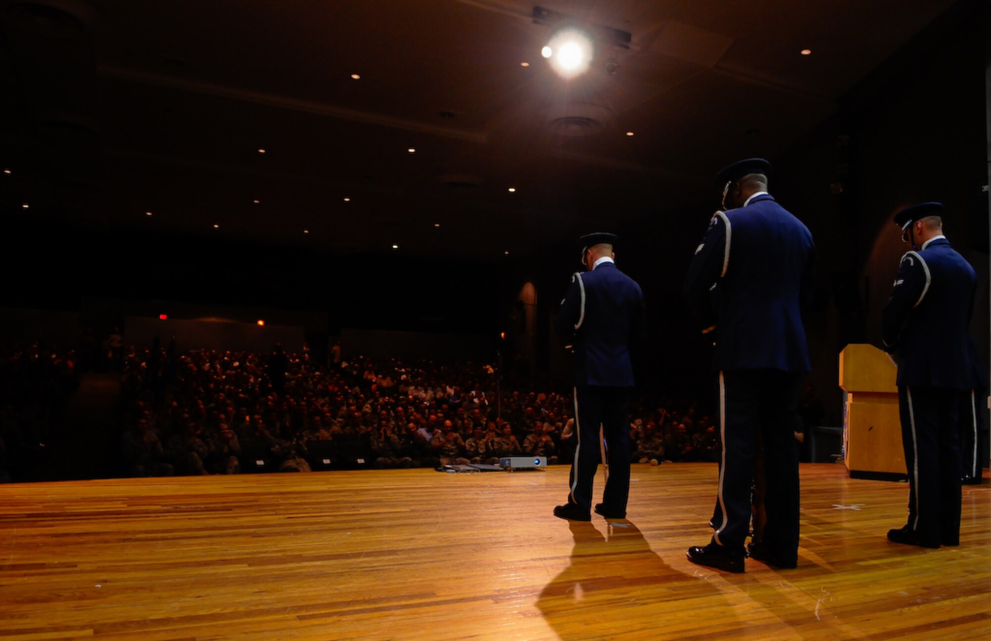 The United States Air Force Honor Guard Drill Team four-man component performs at a commander’s call for the 45th Space Wing Aug. 28 at Patrick Air Force Base, Fla. The four-man team left directly after the performance to join the rest of the team at Eau Gallie High School for the second of their three performances. During the Florida tour, the Drill Team will be performing at military installations and local schools and communities to help raise awareness of the Air Force mission. (U.S. Air Force photo by Senior Airman Alexandre Montes)  