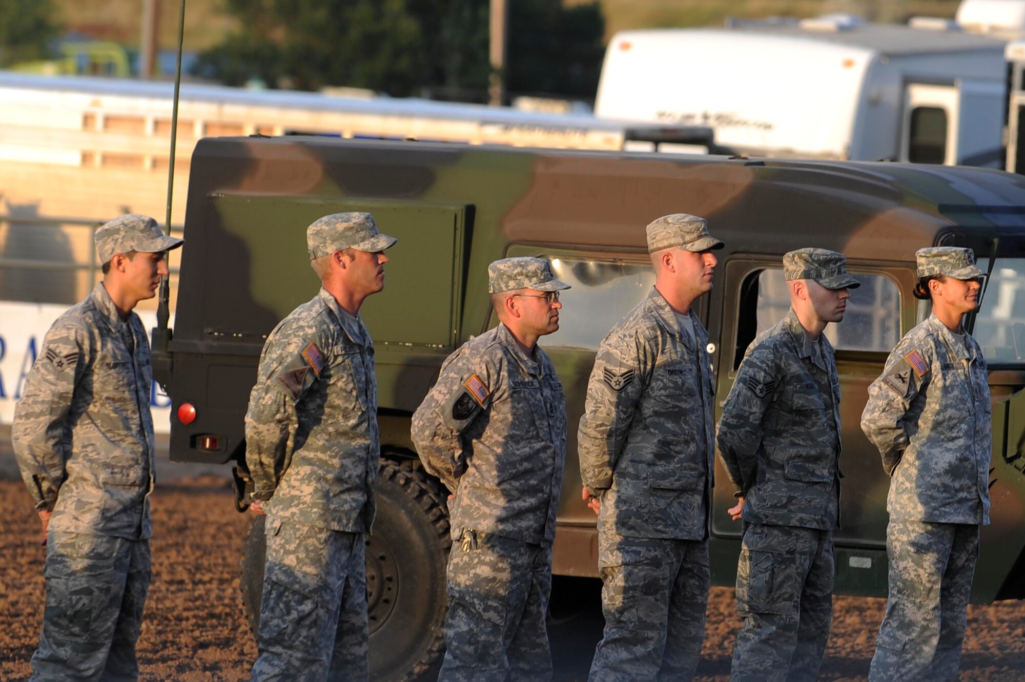Airmen from Ellsworth Air Force Base, and Soldiers from Camp Rapid are recognized during military appreciation day at the Central States Fair PRCA Range Day Rodeo in Rapid City, S.D., August 27. Military appreciation day applies to all members of the active military, National Guard and Reserve. (U.S. Air Force photo by Airman 1st Class Corey Hook)