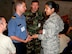 Capts Eugenia Ramirez of the 459 Air Refueling Wing, Andrews ABF, MD and Scott McPherson of the 482nd Civil Engineering Squadron, Homestead ARB, FL chats with classmates while on a break during the 2009 IJOLD Seminar held in Toronto Canada, Aug 17-21. (U.S. Air Force photo/2nd Lt Joe Simms)
