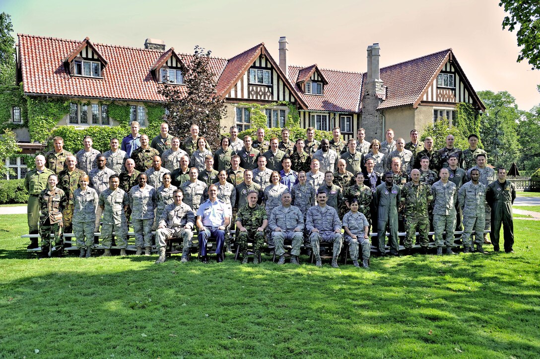 IJOLDS students pose for their class photo in front of the officer's mess at the Canadian Forces College. The International Junior Officer Development Seminar was held in Toronto, Ontario, Canada Aug 17-21. 