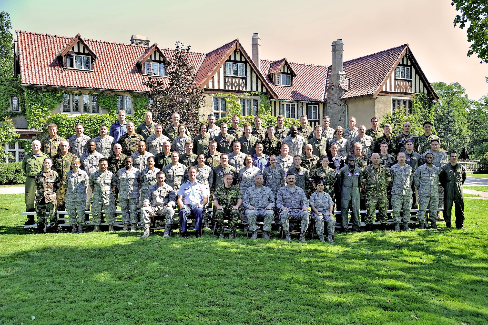 IJOLDS students pose for their class photo in front of the officer's mess at the Canadian Forces College. The International Junior Officer Development Seminar was held in Toronto, Ontario, Canada Aug 17-21. 